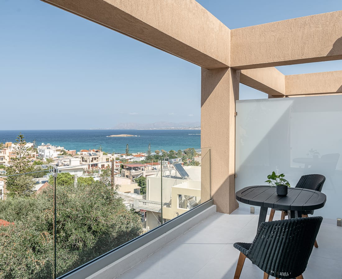 a room with a couch and a plant