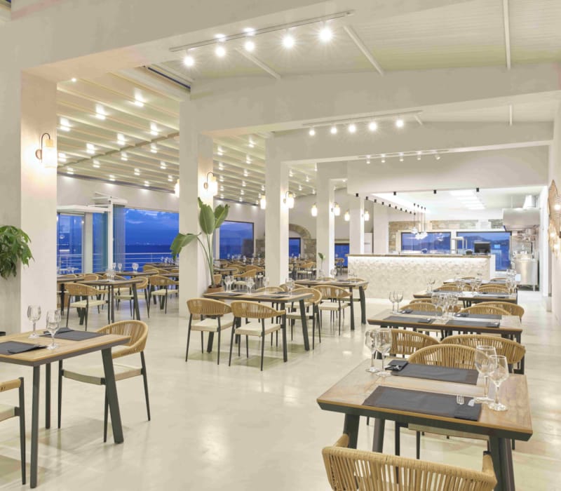 a room with tables and chairs