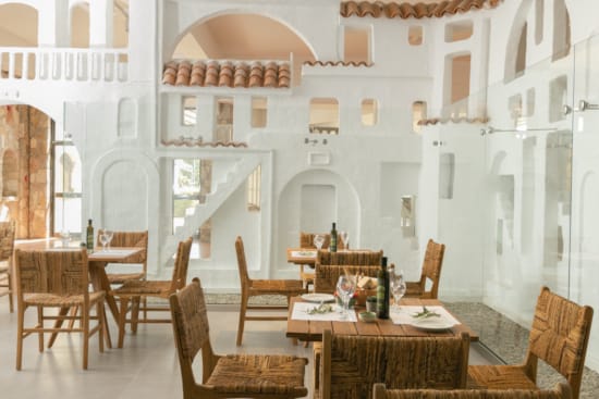 a room with tables and chairs