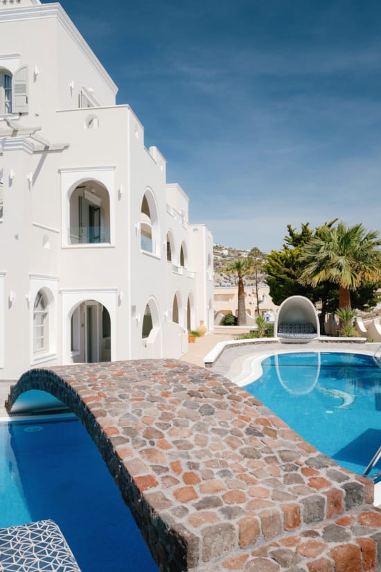 a white building with a pool