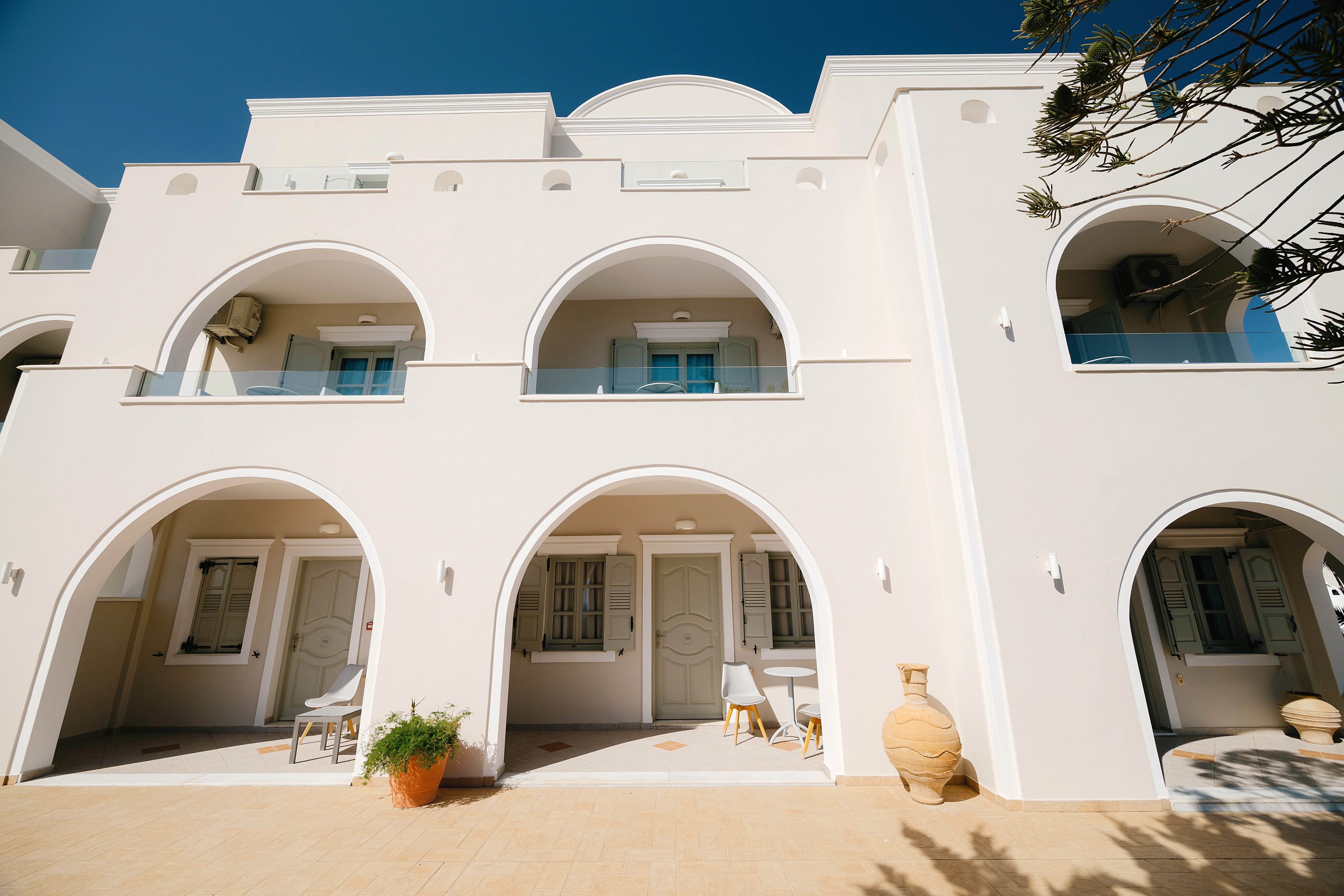 a white house with a few windows