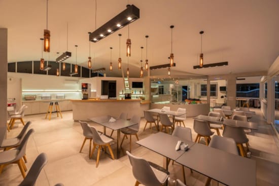 a room with tables and chairs