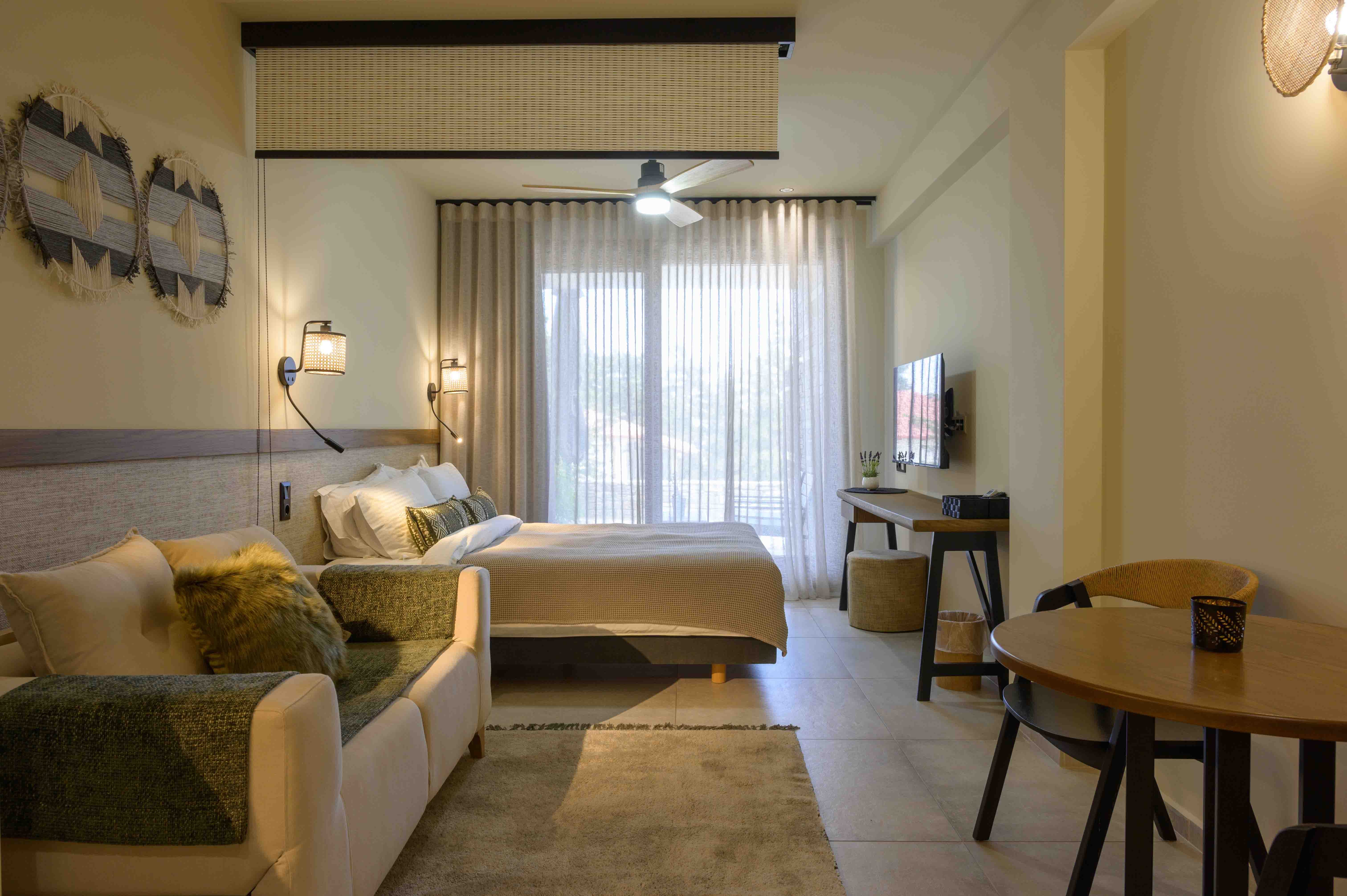 a living room with a couch and a tv