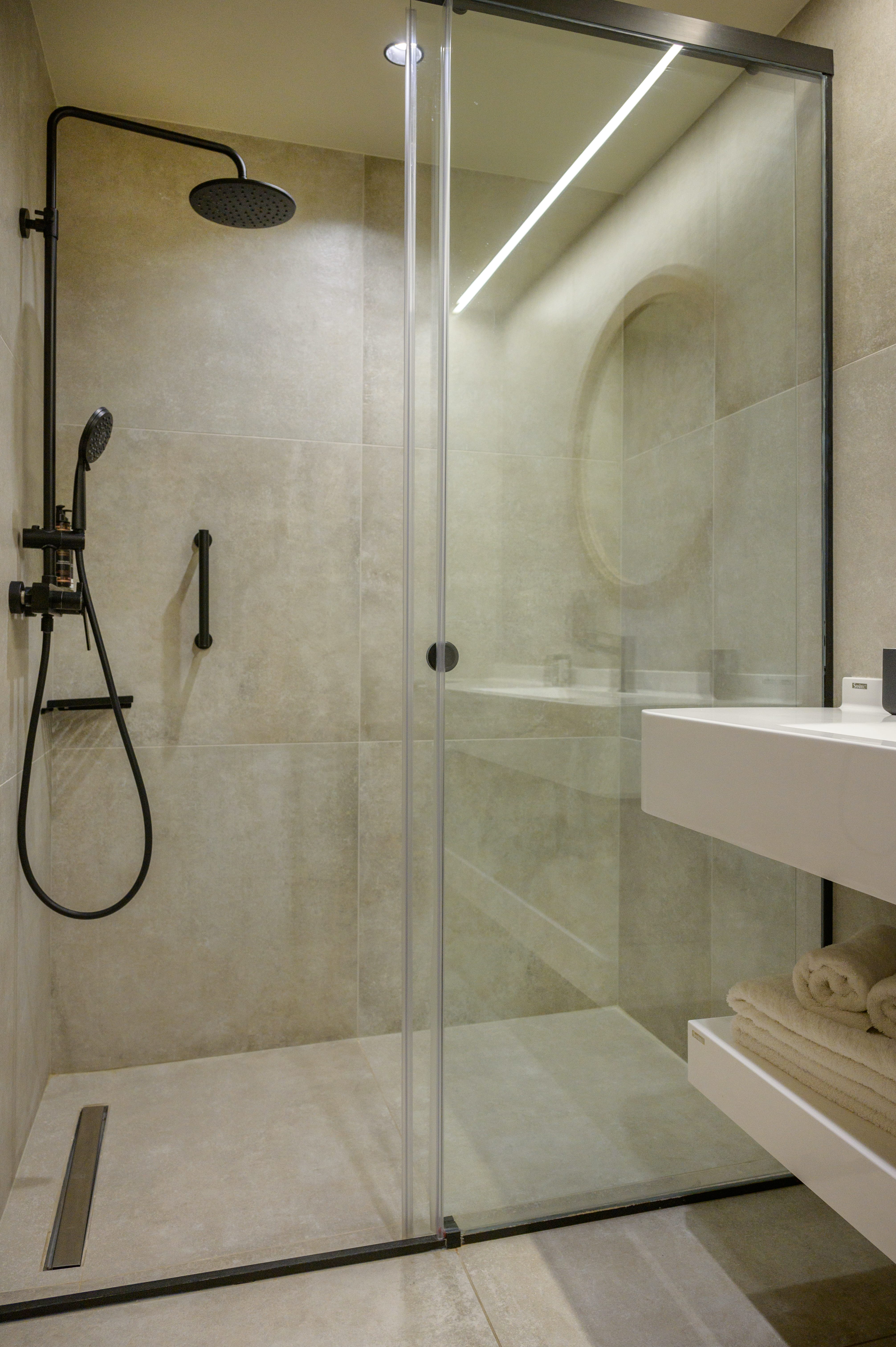 a shower with a glass door