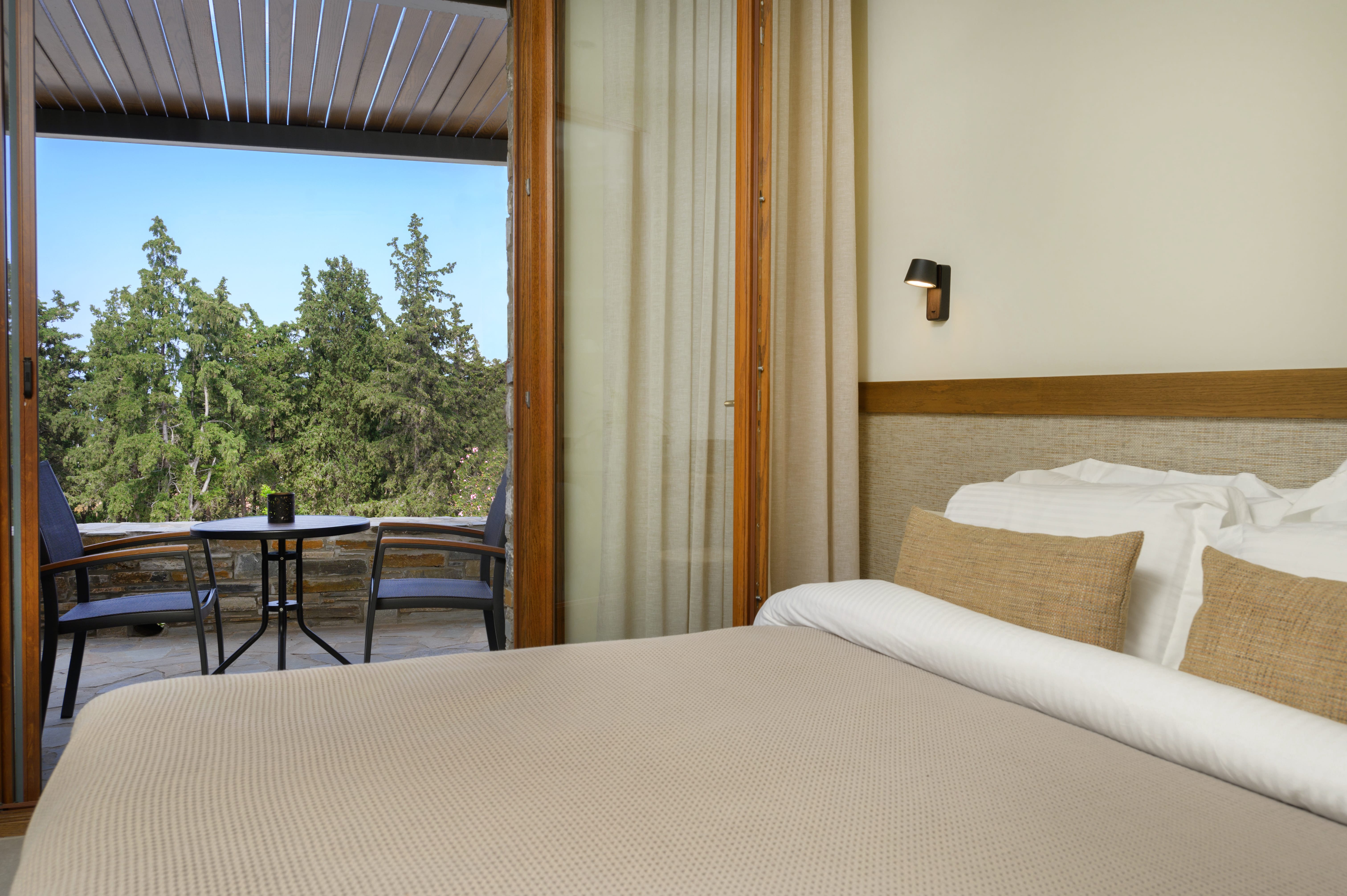 a hotel room with a large window