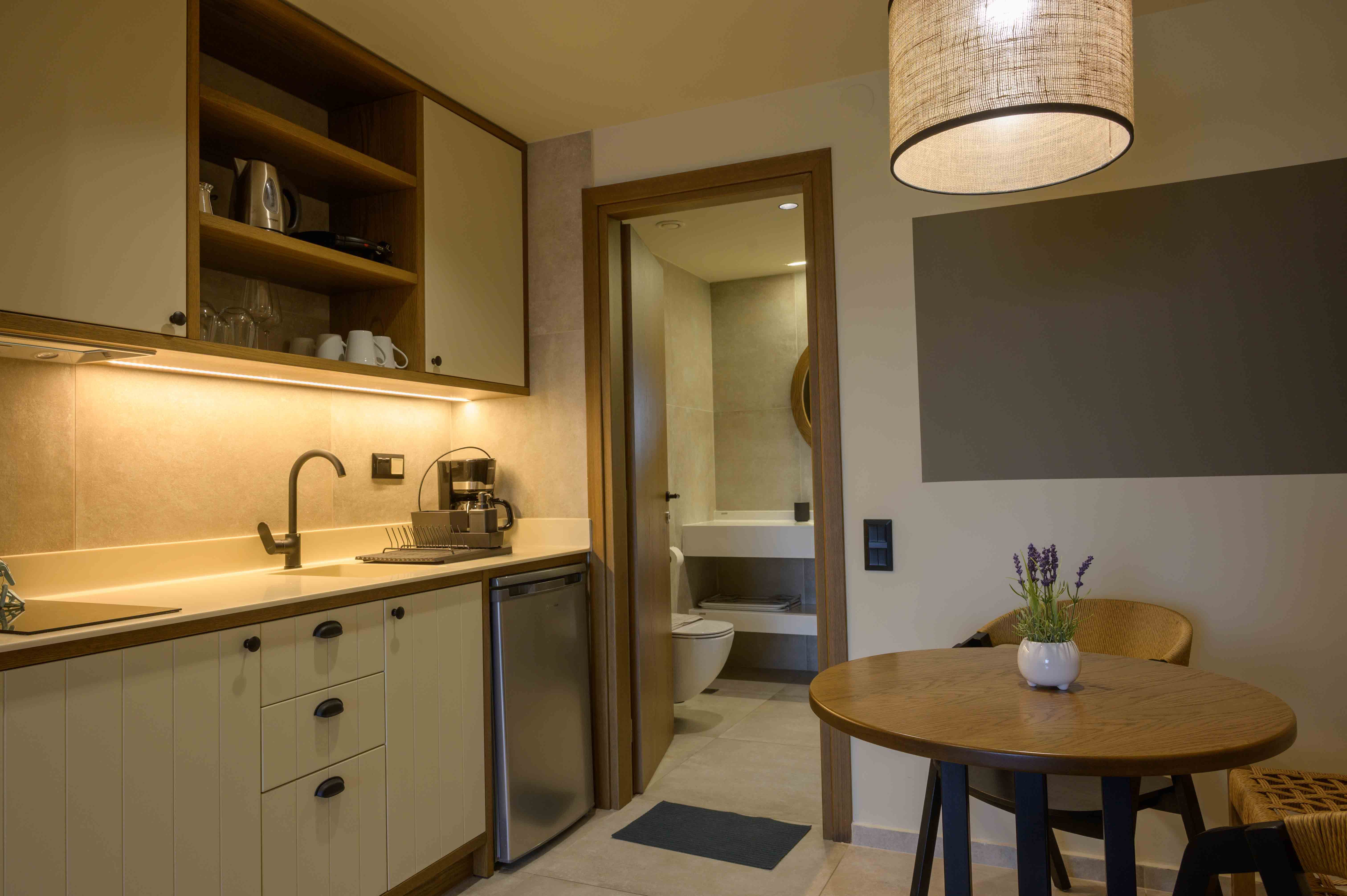 a kitchen with a table and a sink