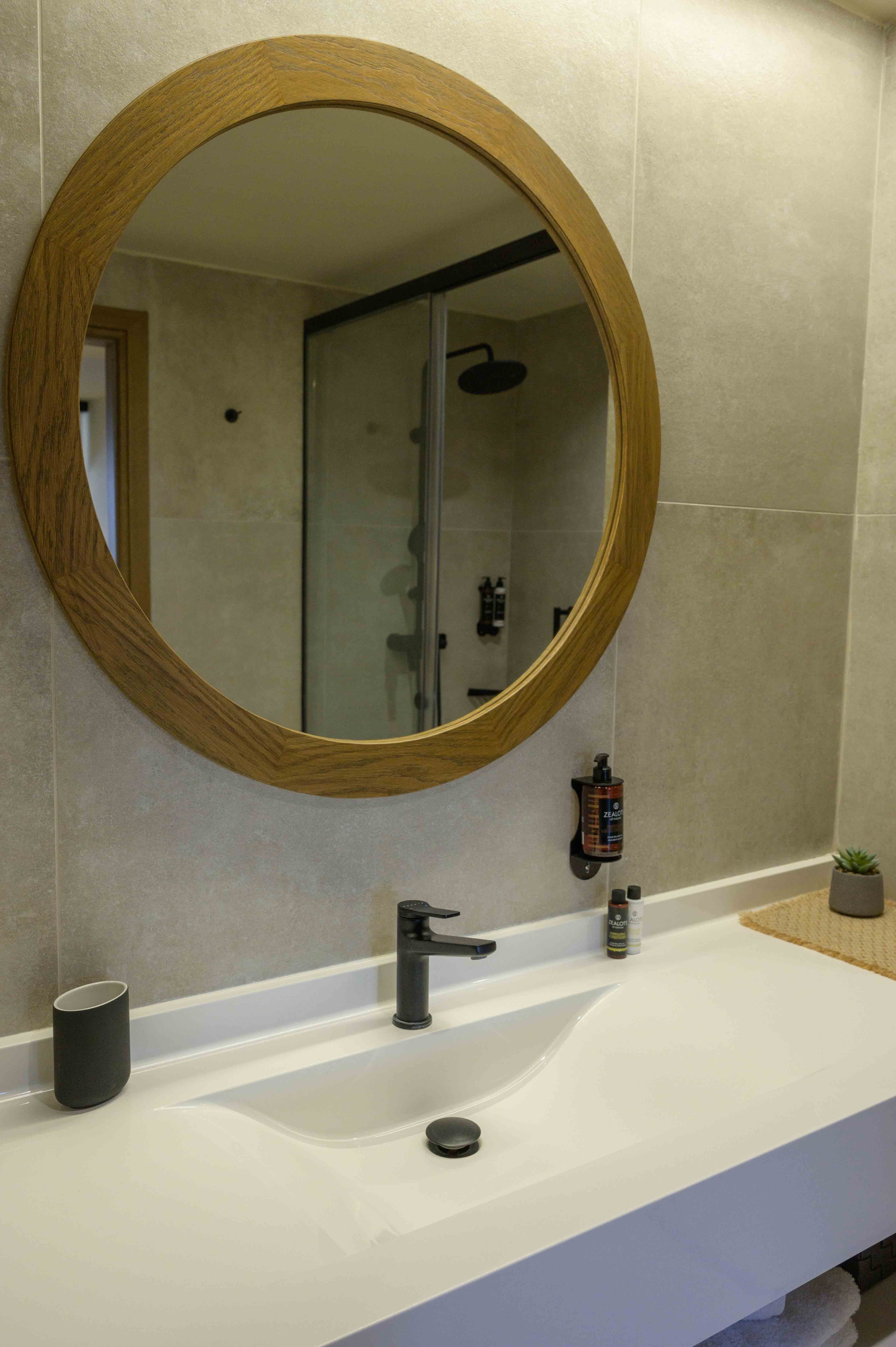 a bathroom with a large mirror