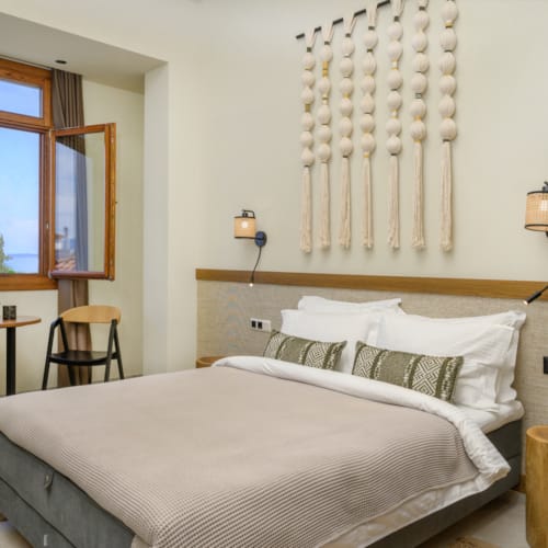 a bed with white sheets