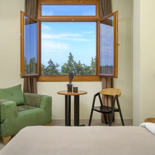 a room with a bed and a table