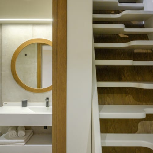 a bathroom with a mirror and a sink