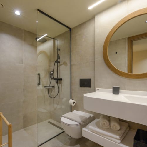 a bathroom with a glass shower