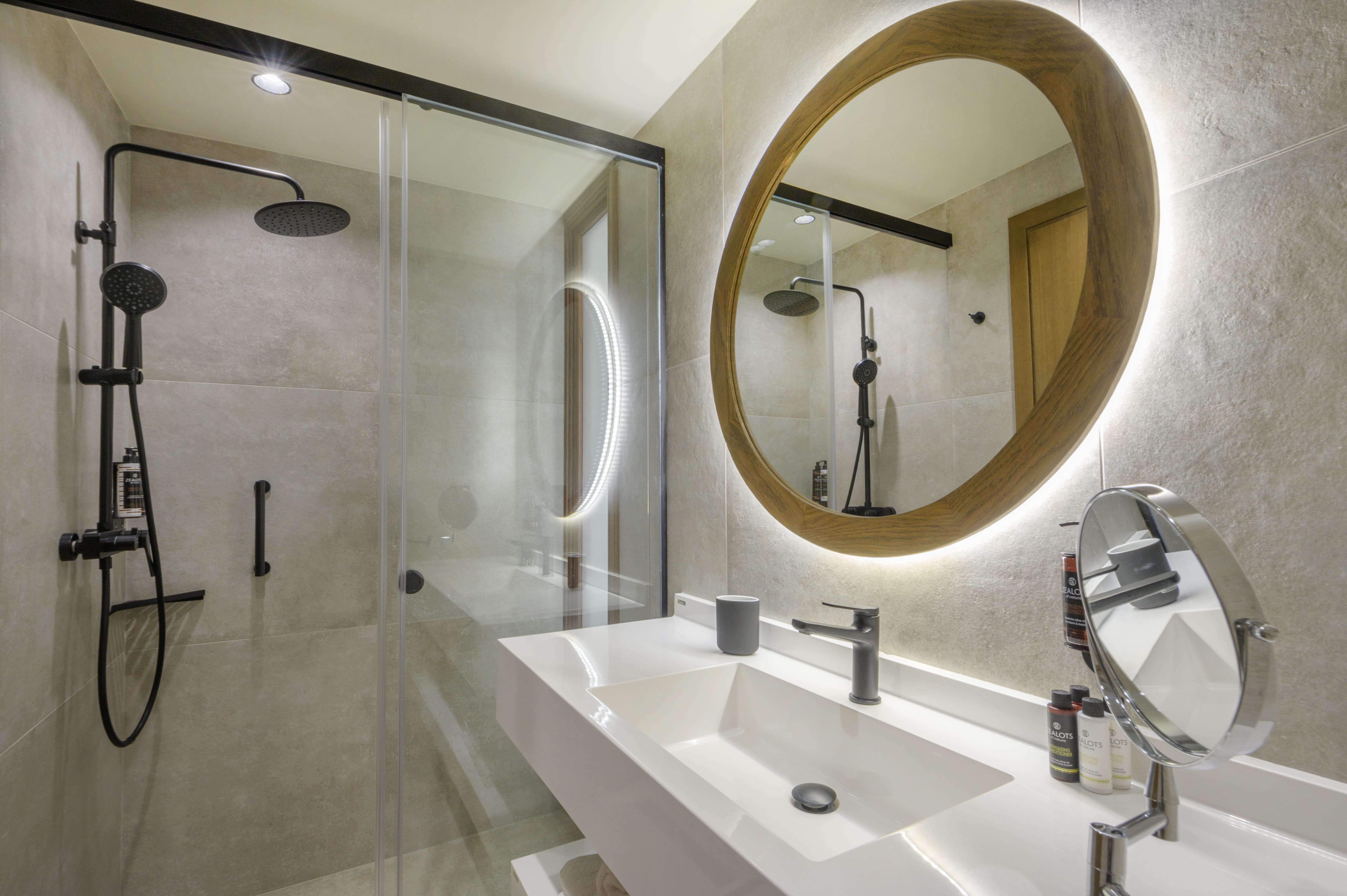 a bathroom with a large mirror