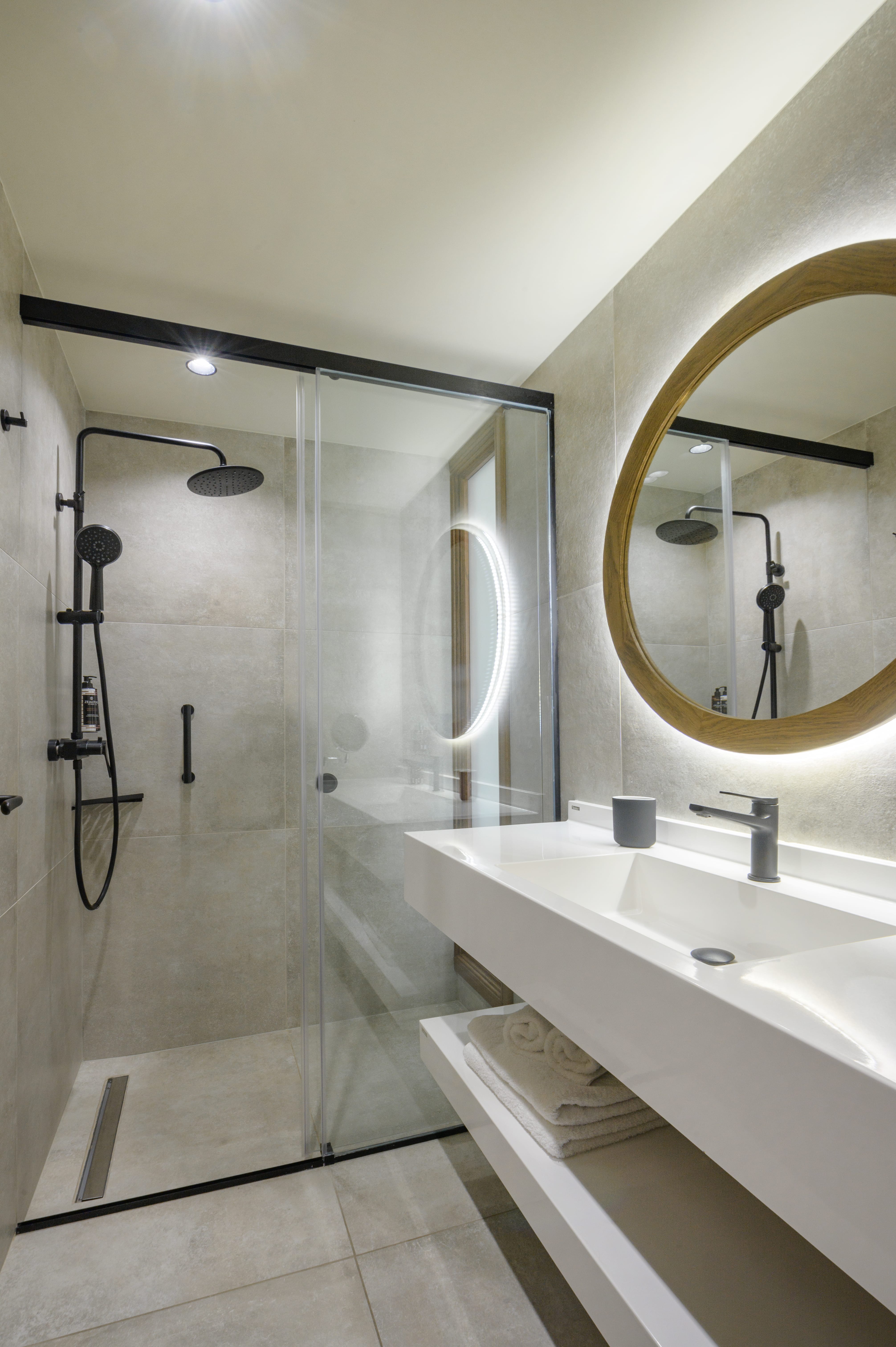 a bathroom with a glass shower