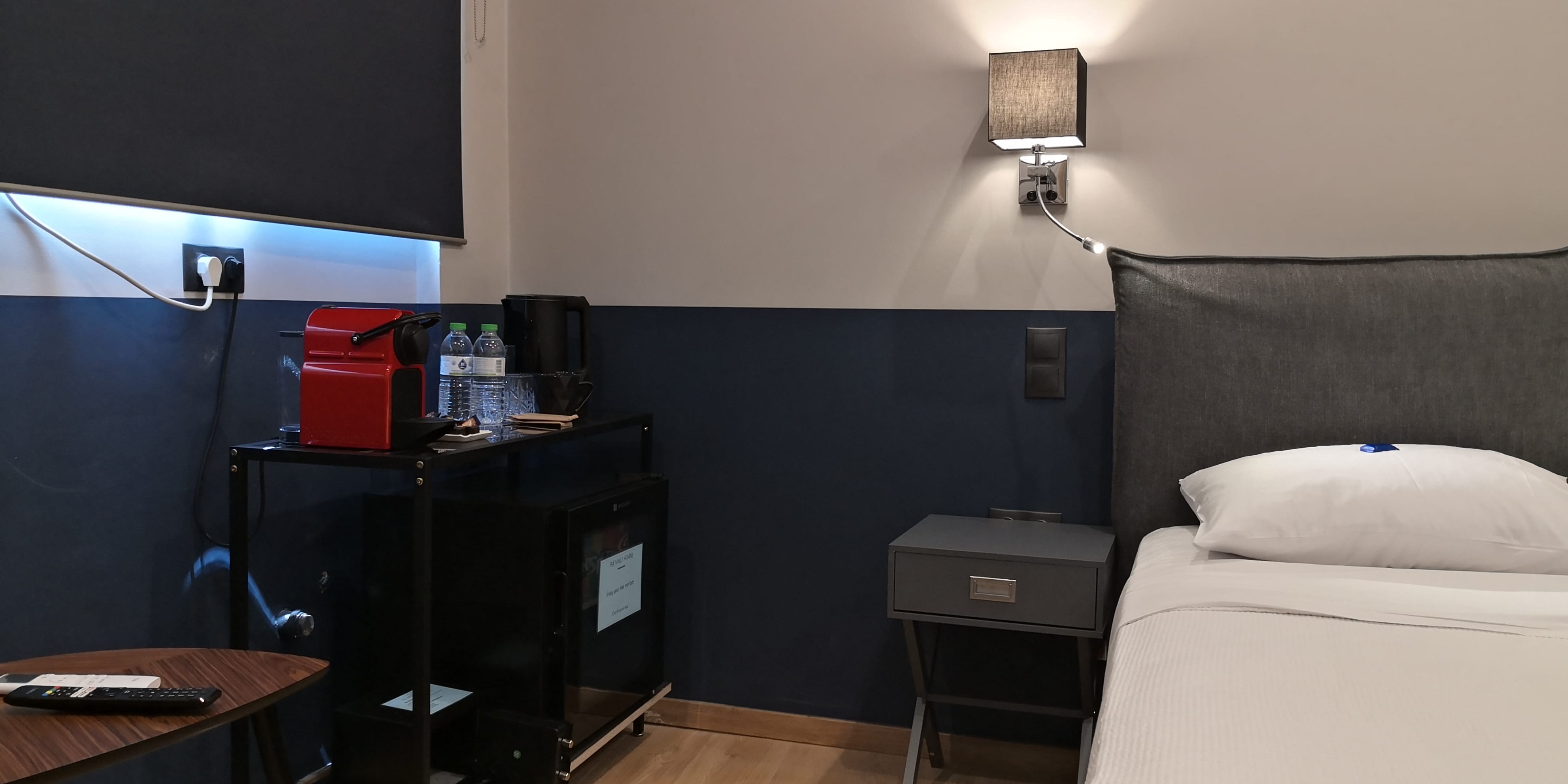 a room with a bed and a desk