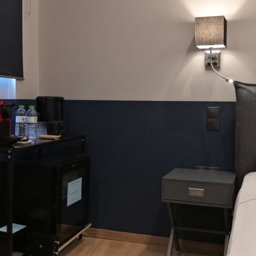 a room with a bed and a desk