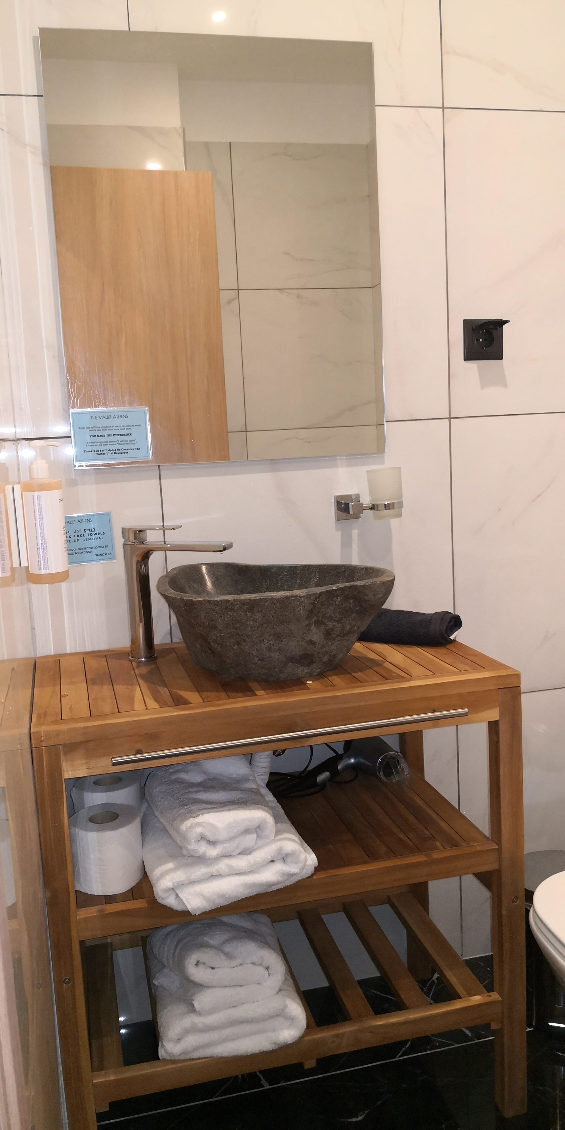 a wooden shelf with a bowl and a bowl on it