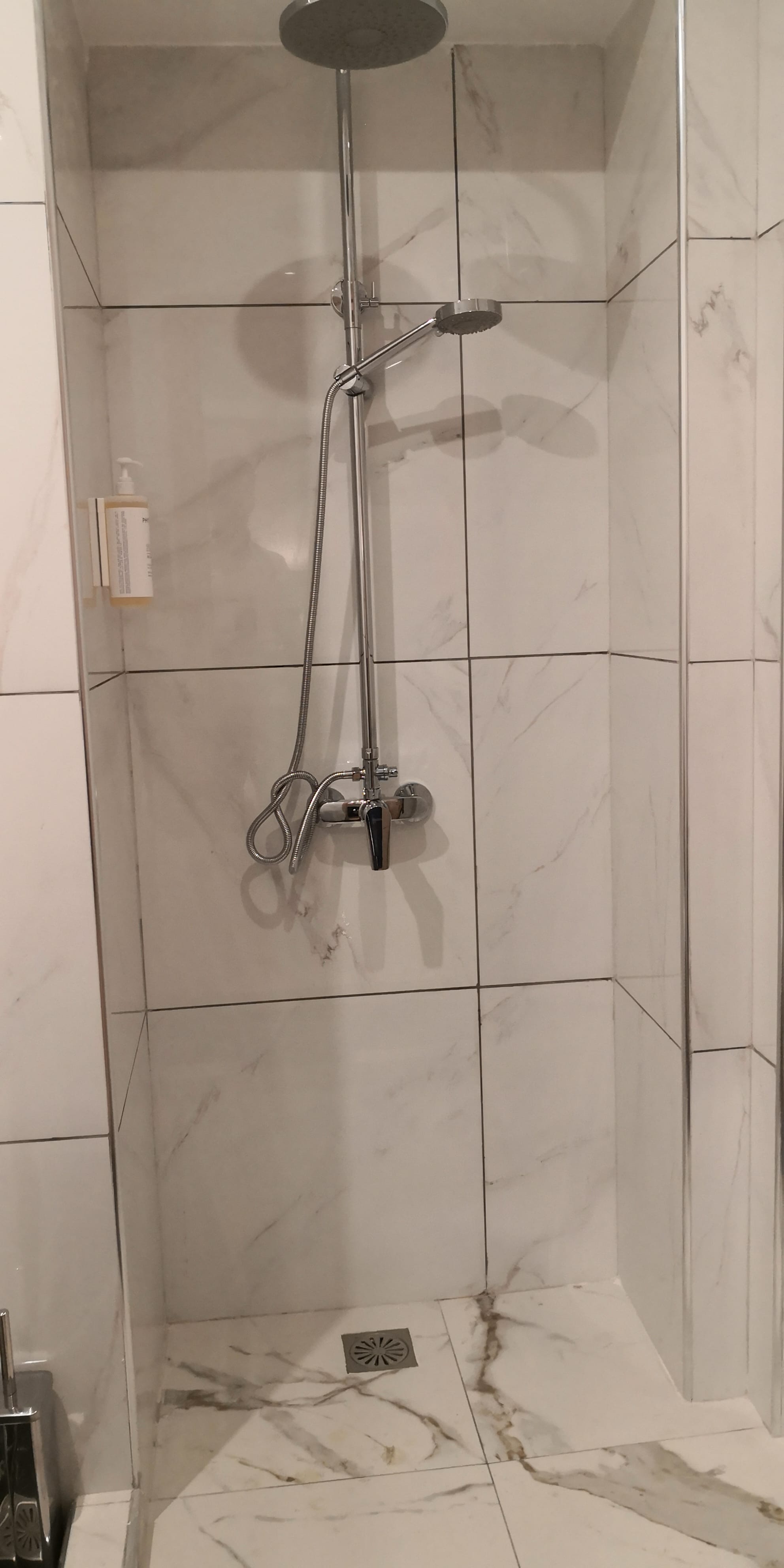 a shower with a glass door