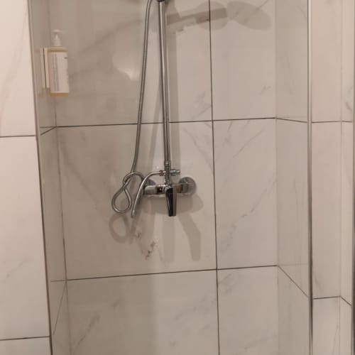 a shower with a glass door