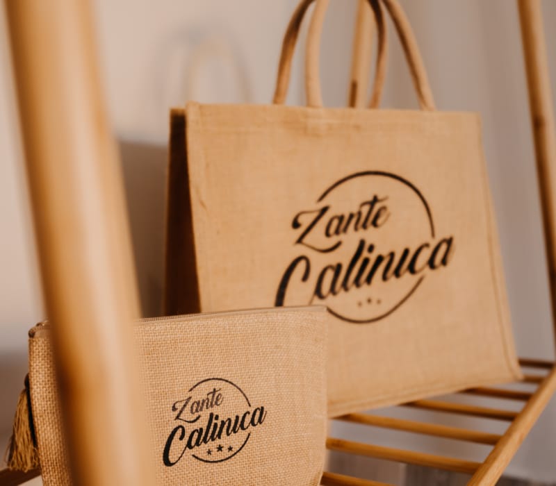 a brown bag with a black logo