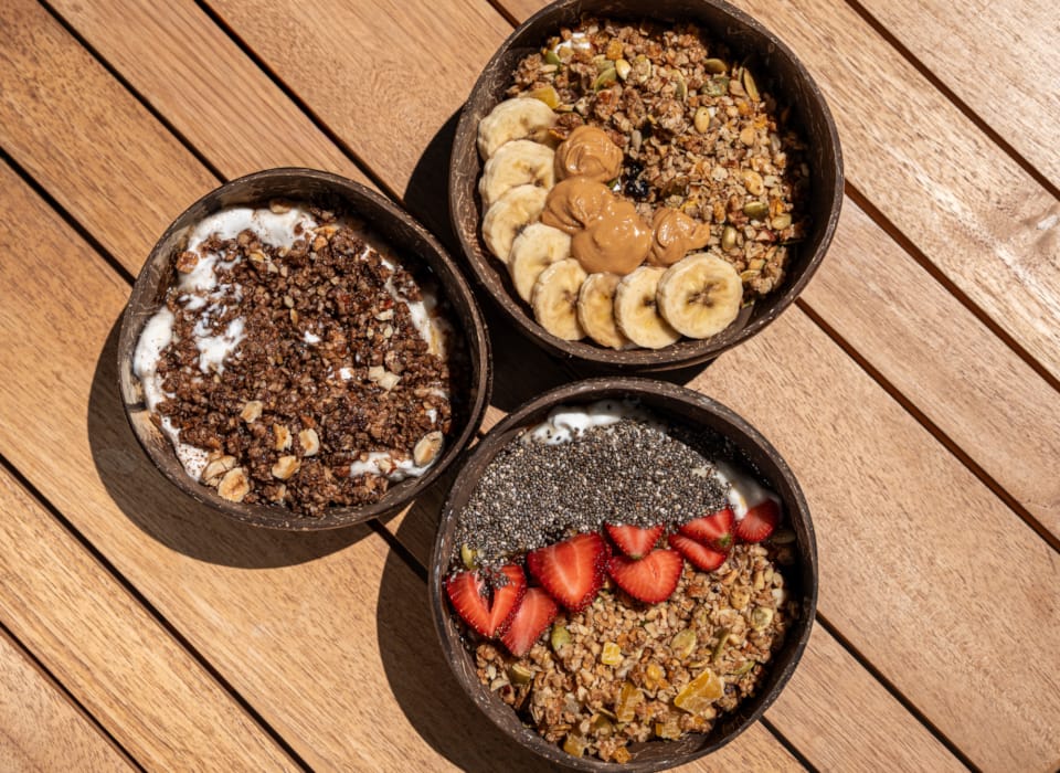 a group of bowls with food in it