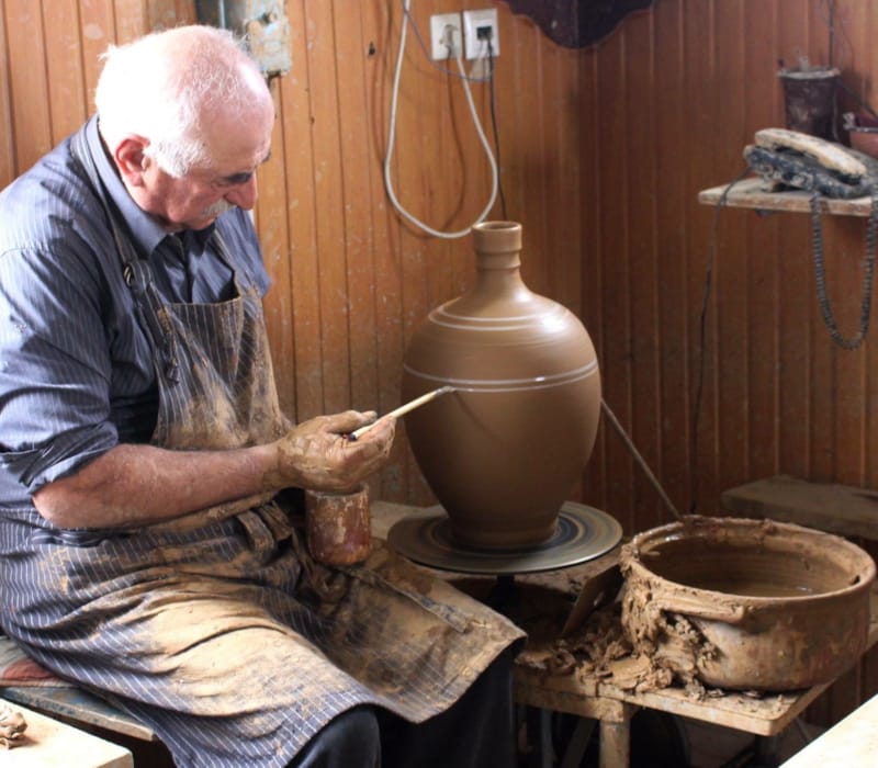 a man cooking in a kitchen