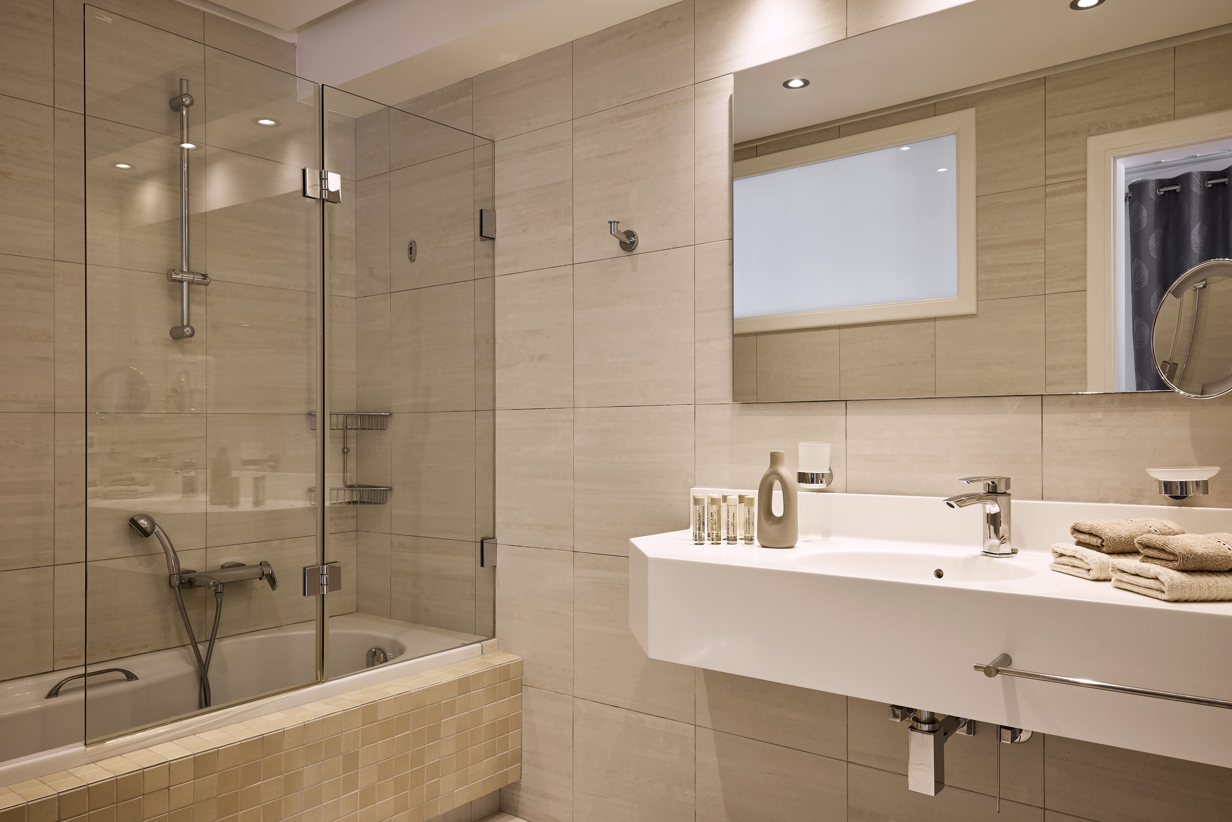 a bathroom with a glass shower