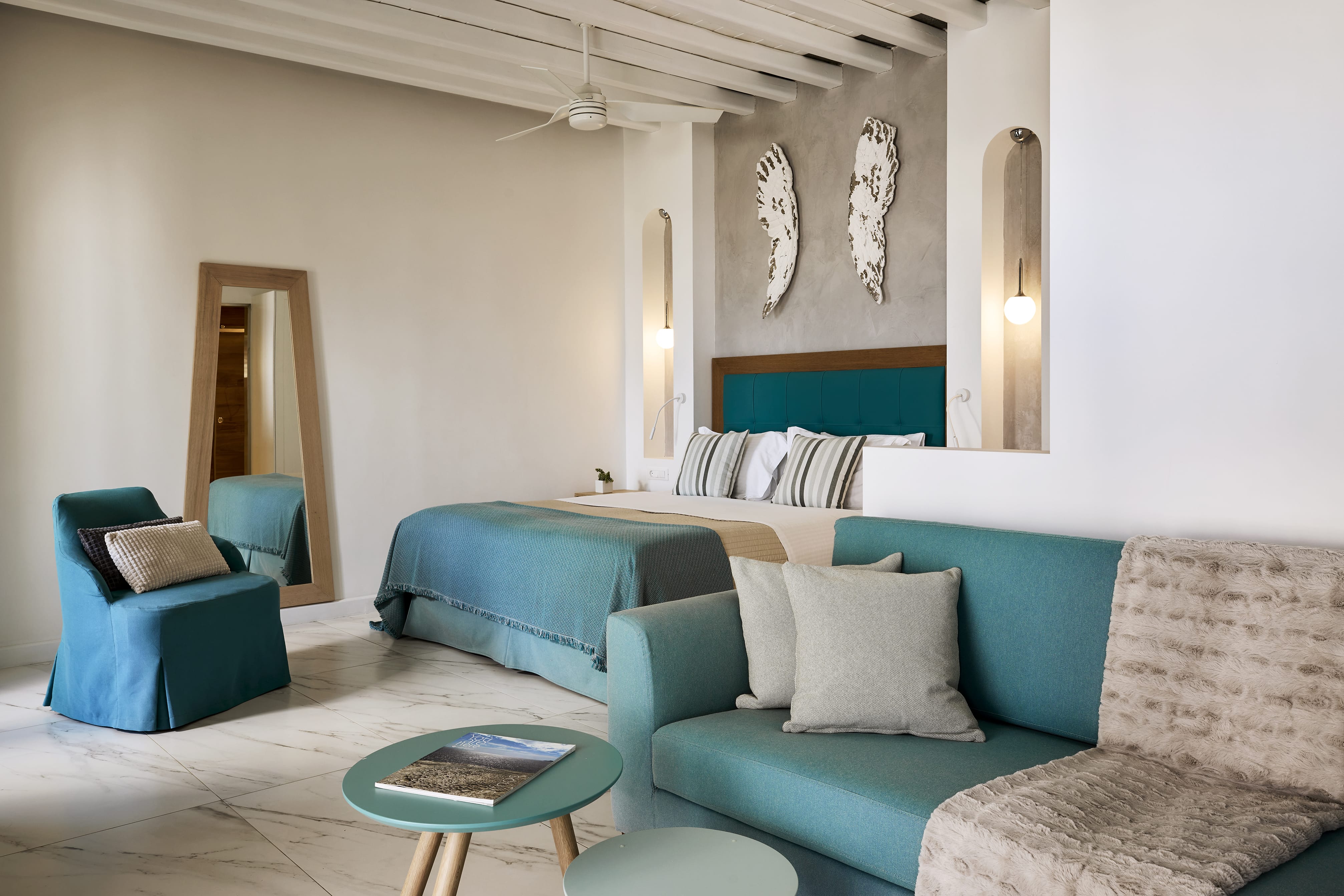 a room with couches and a table