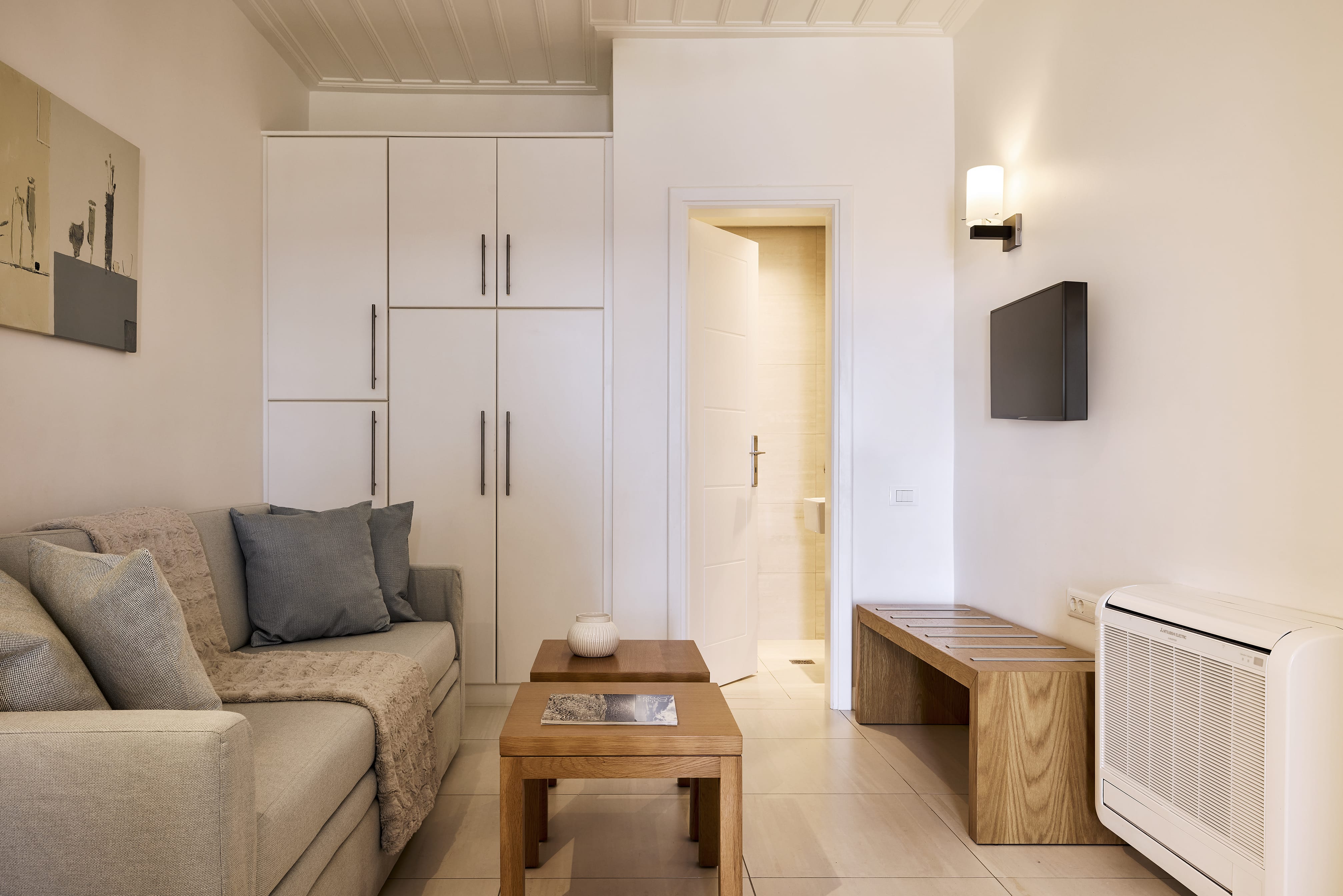 a living room with a couch and a table