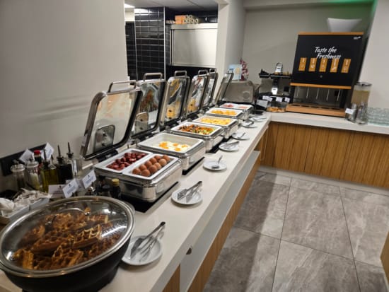 a buffet line of food