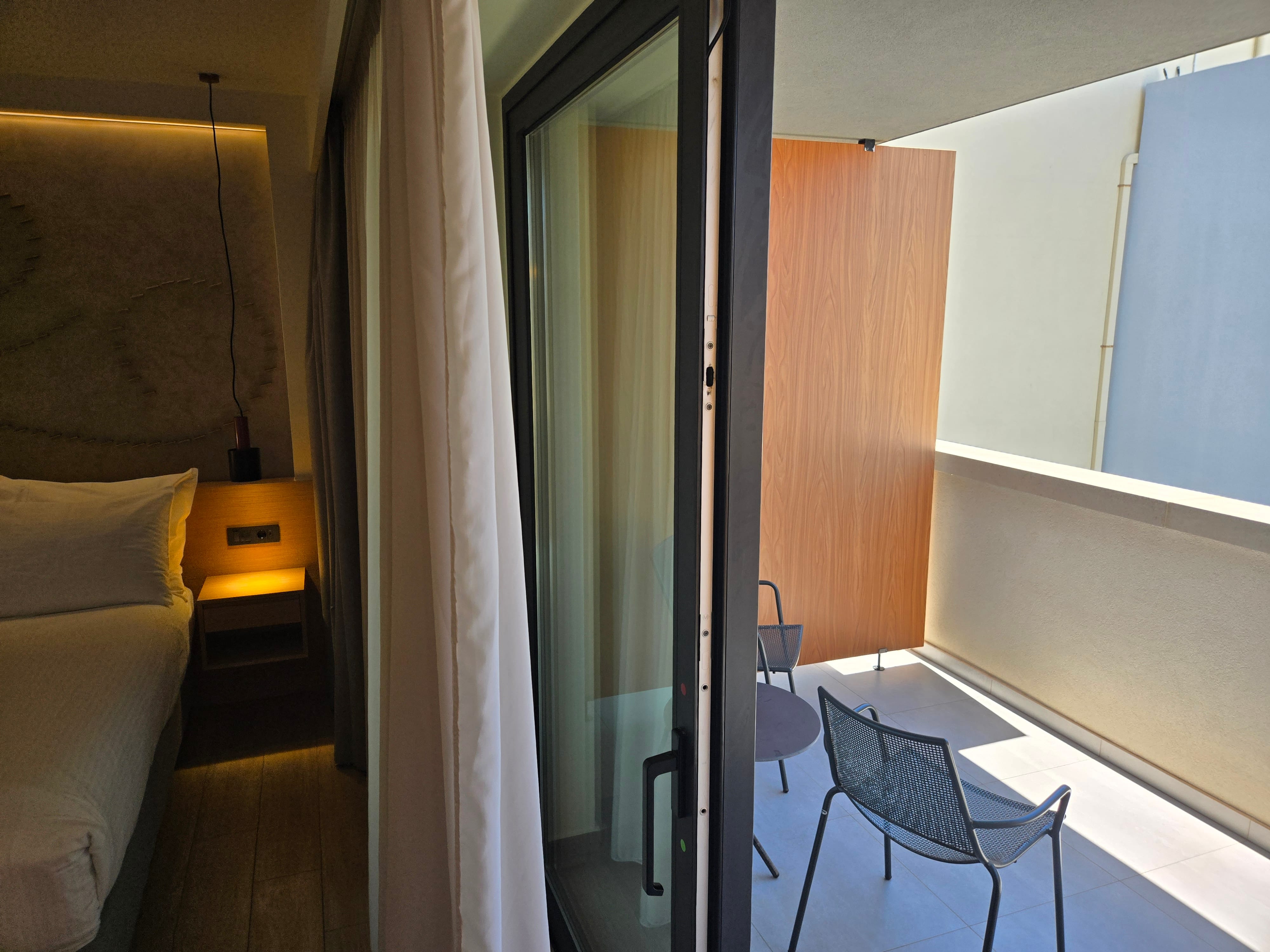a room with a bed and a chair