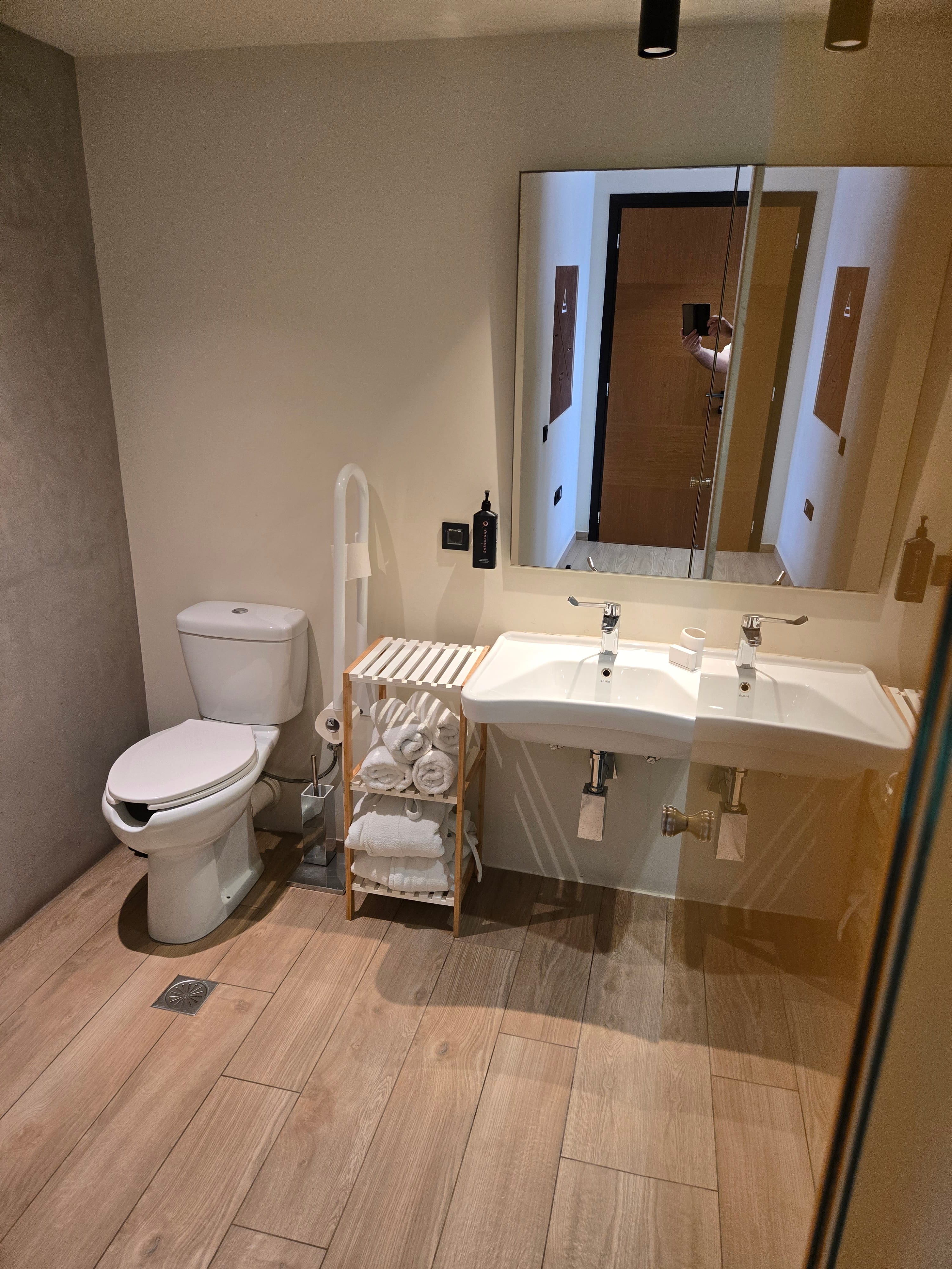 a bathroom with a mirror and sink