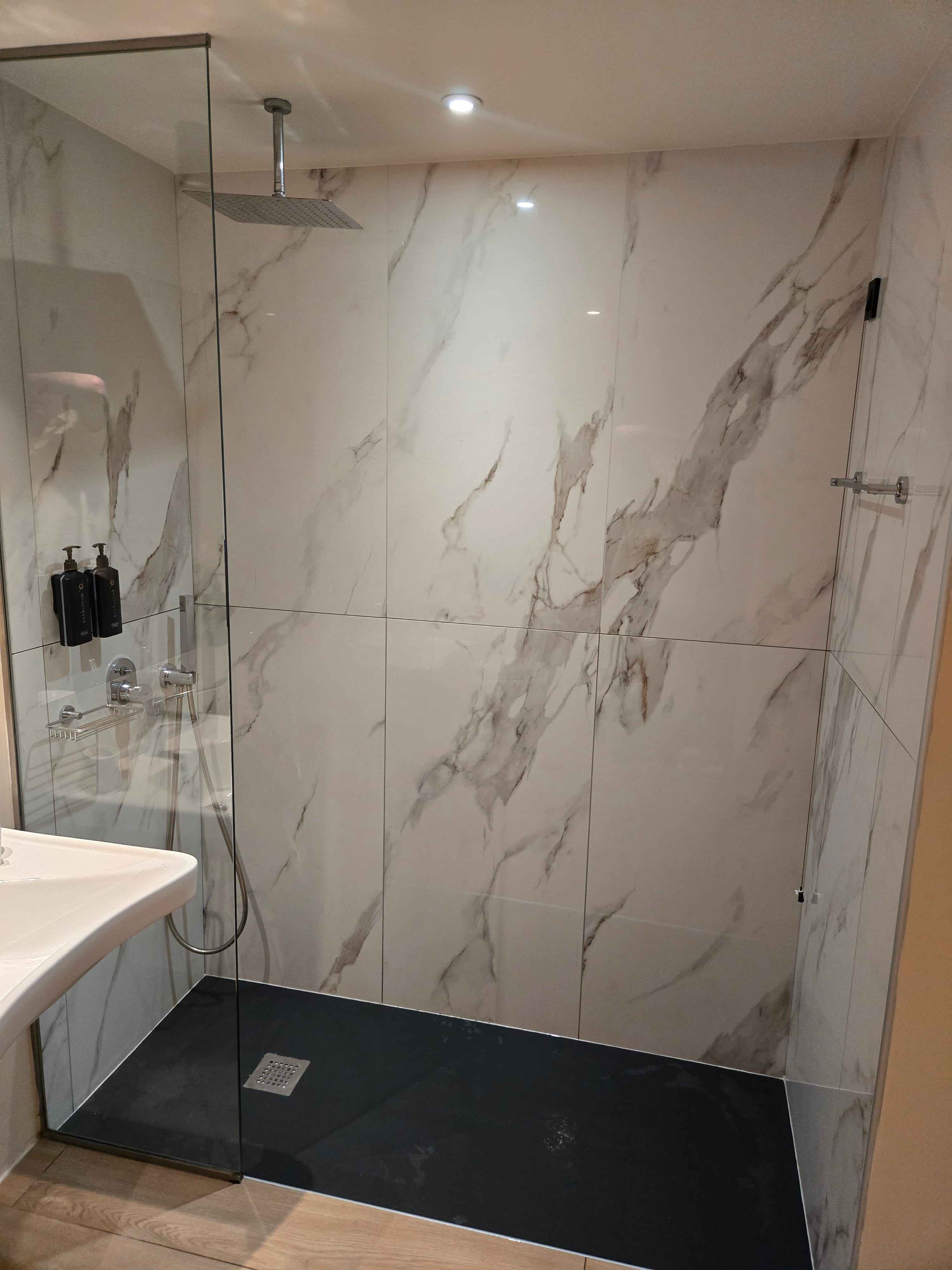 a shower with a glass door