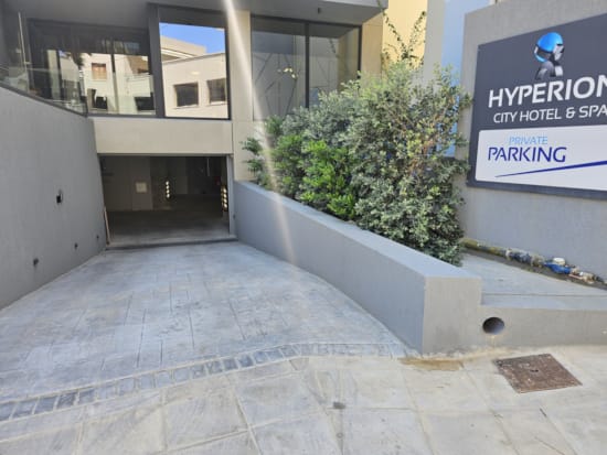 a building with a tree in the front