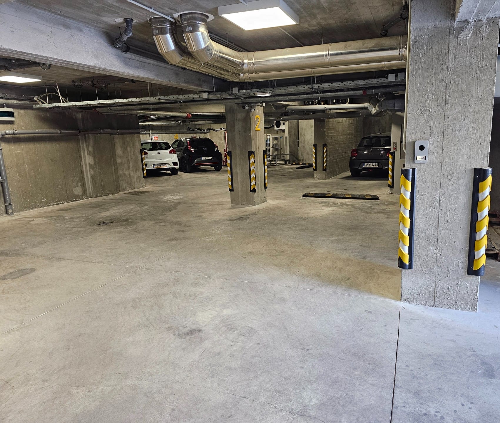 a parking garage with cars