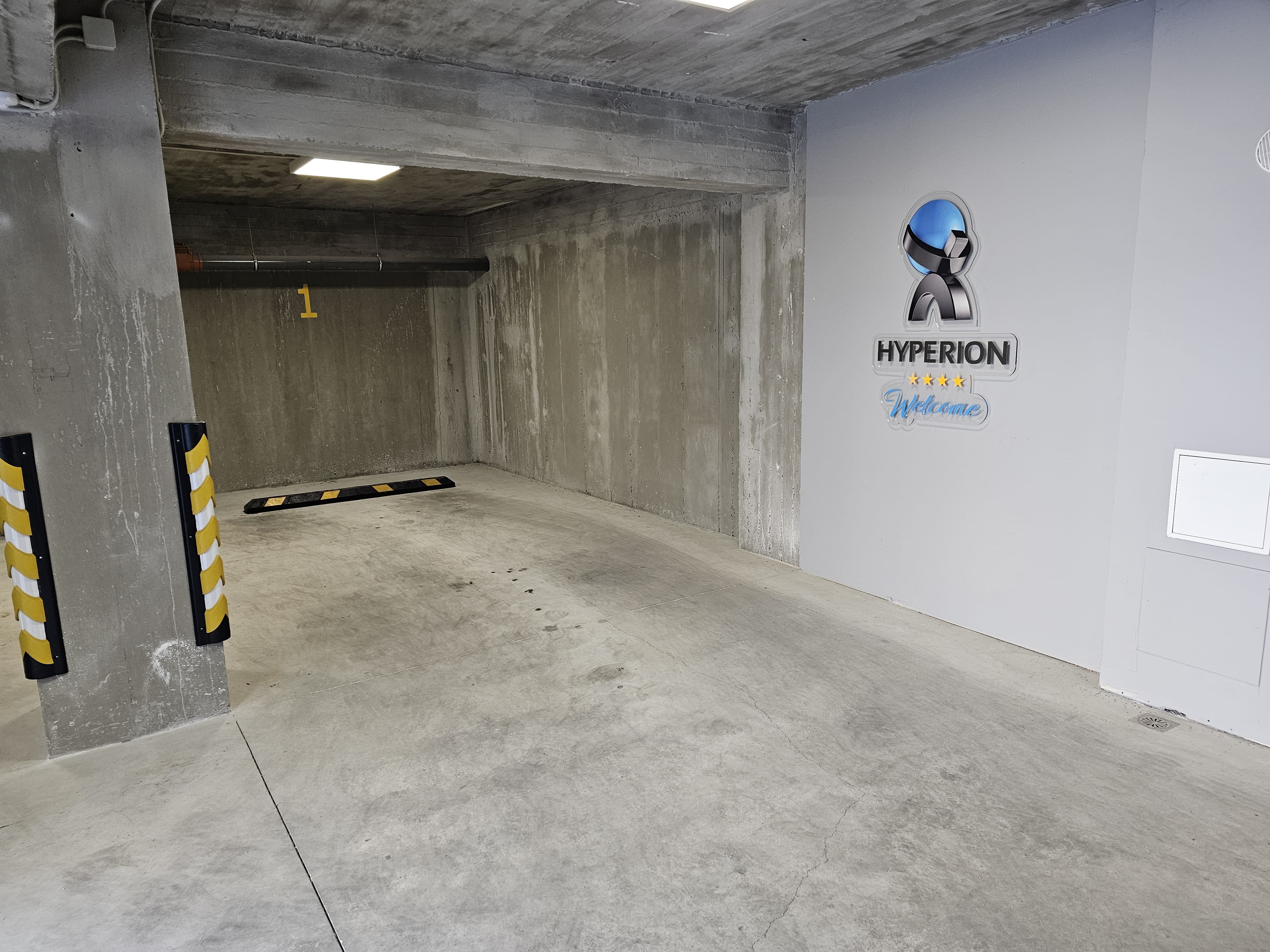 a hallway with a sign on the wall