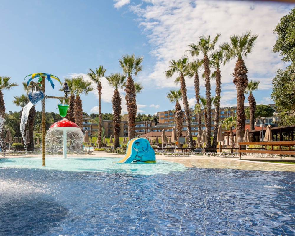 a pool with a slide in it