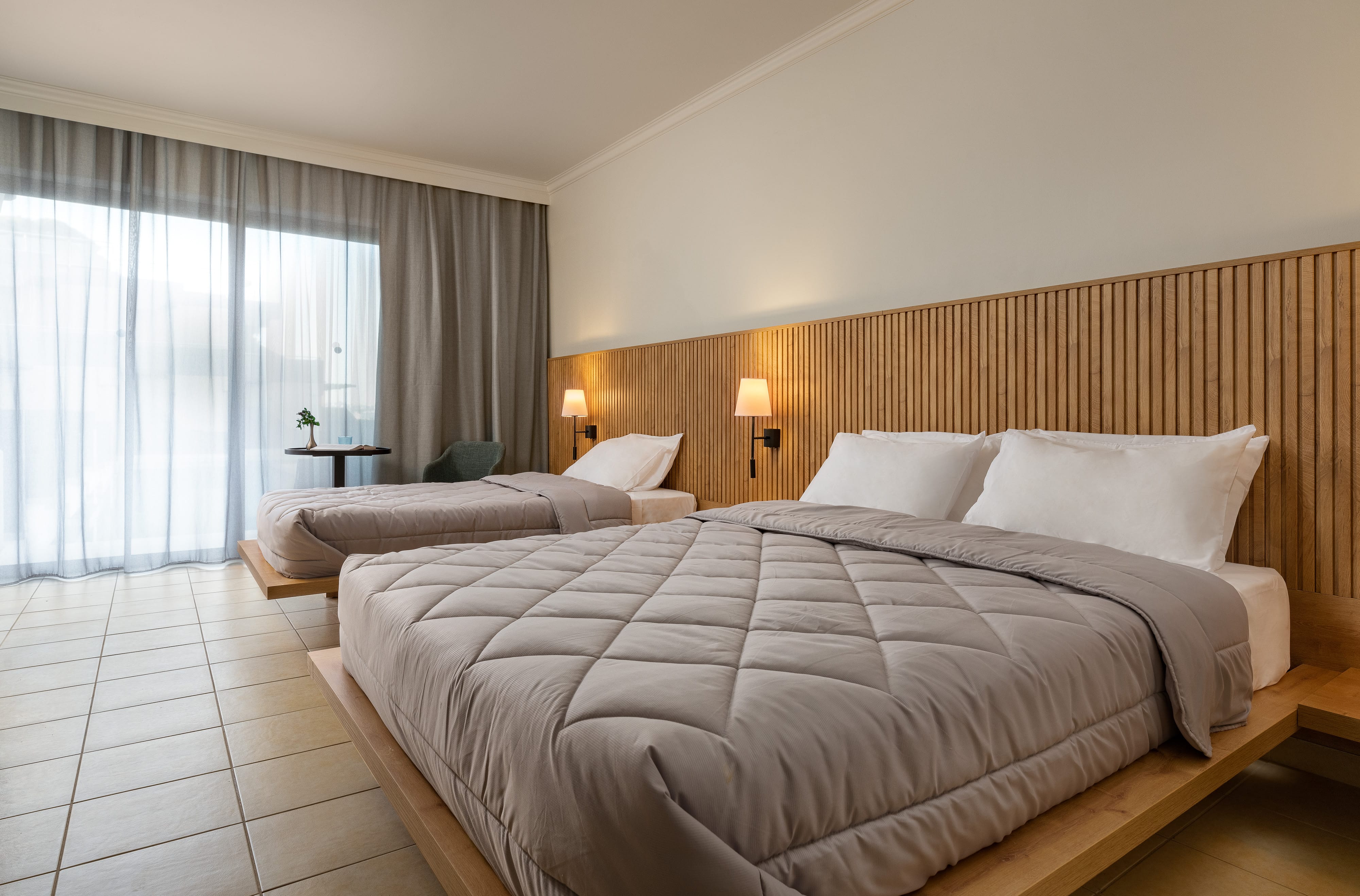 a hotel room with two beds