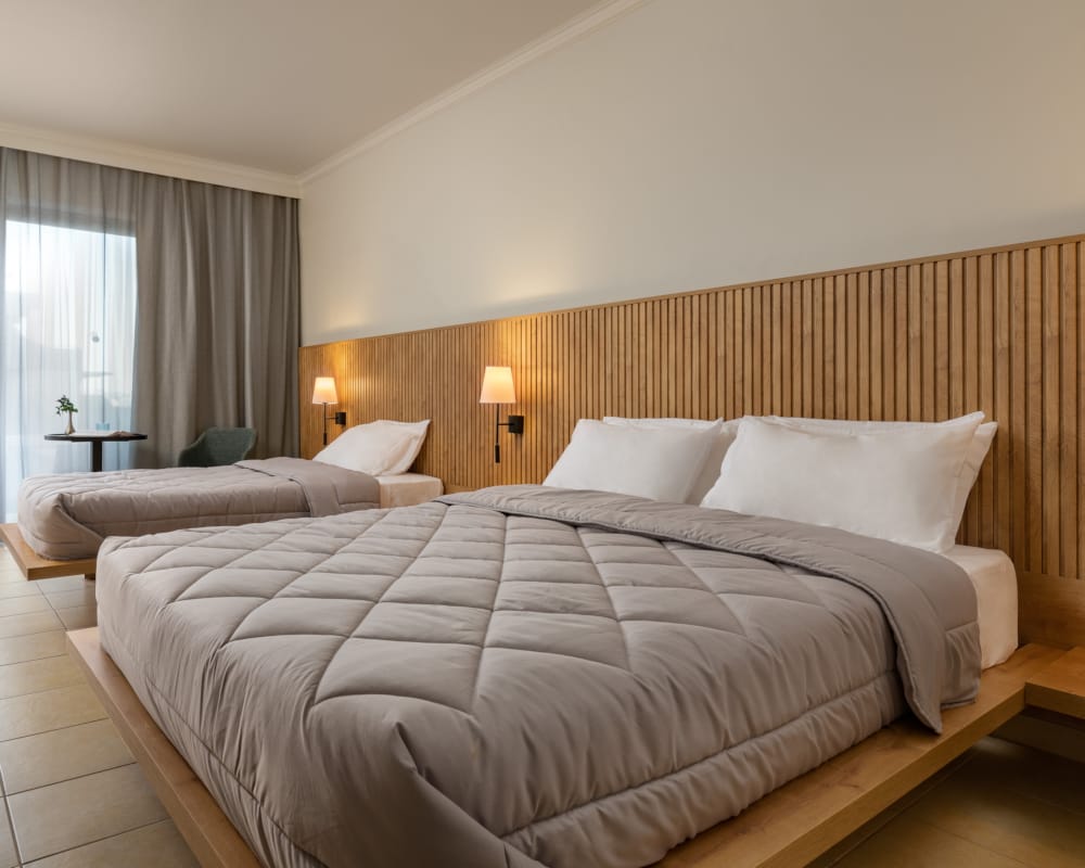 a hotel room with two beds