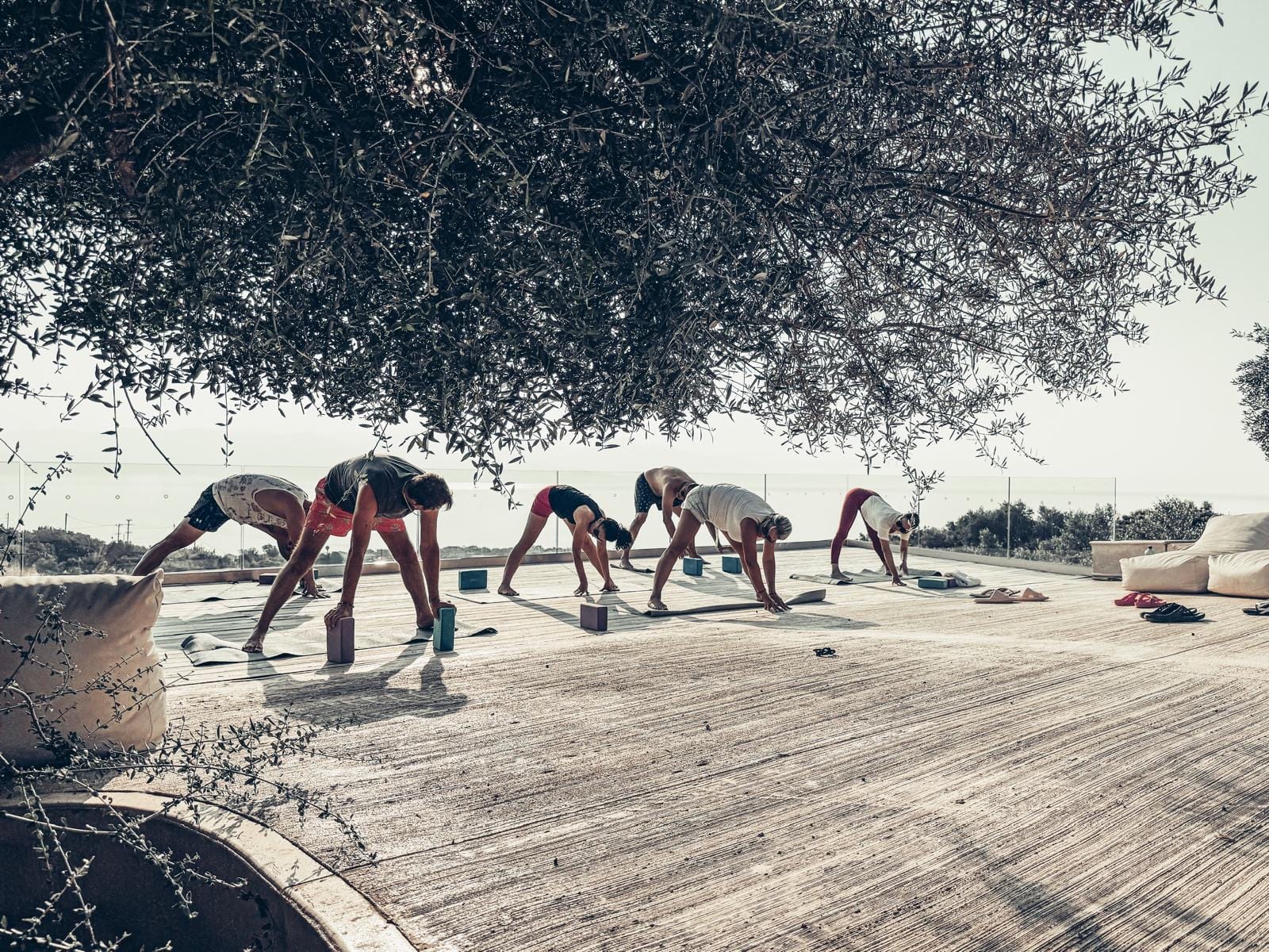 a group of people bending over