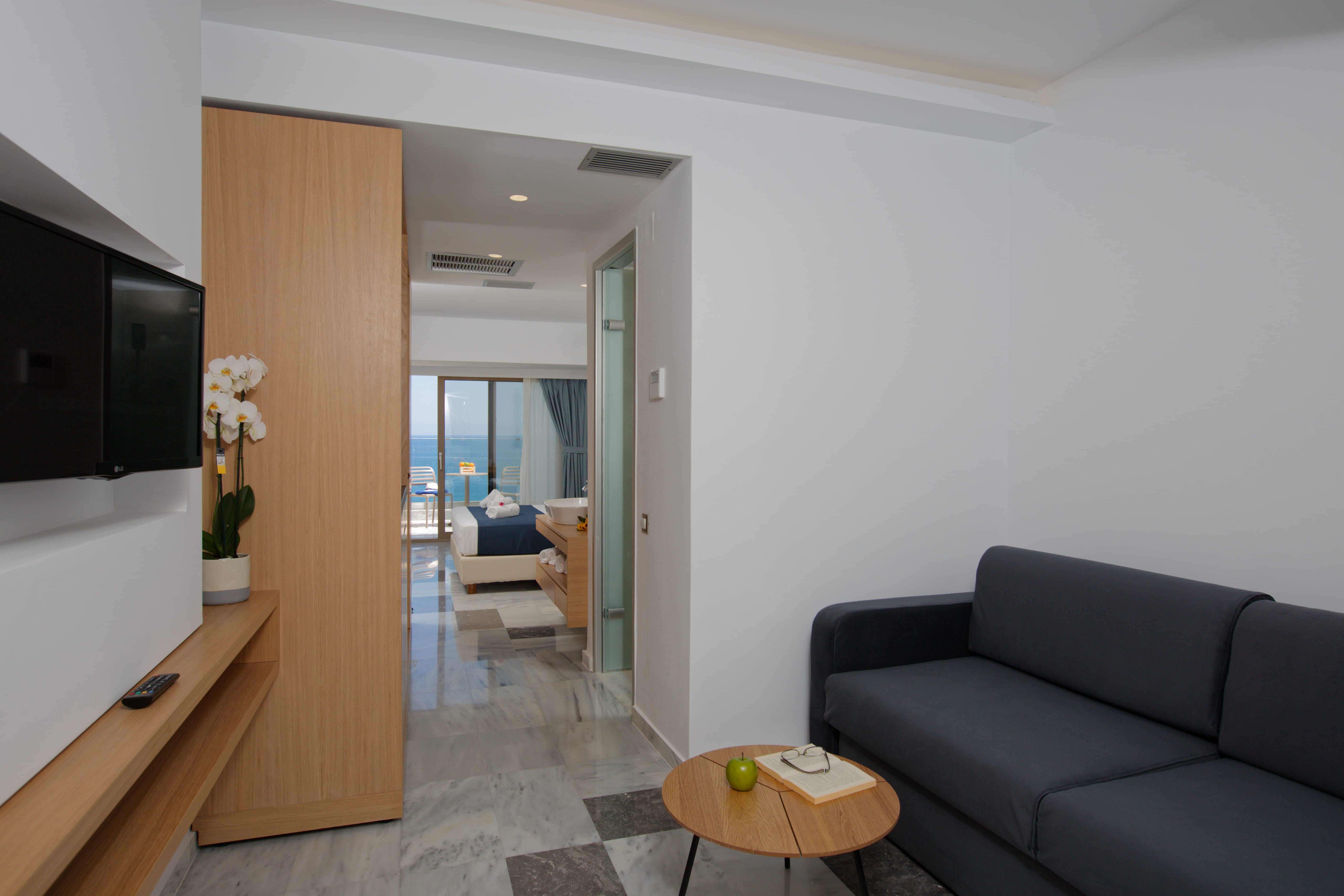 a living room with a couch and a table