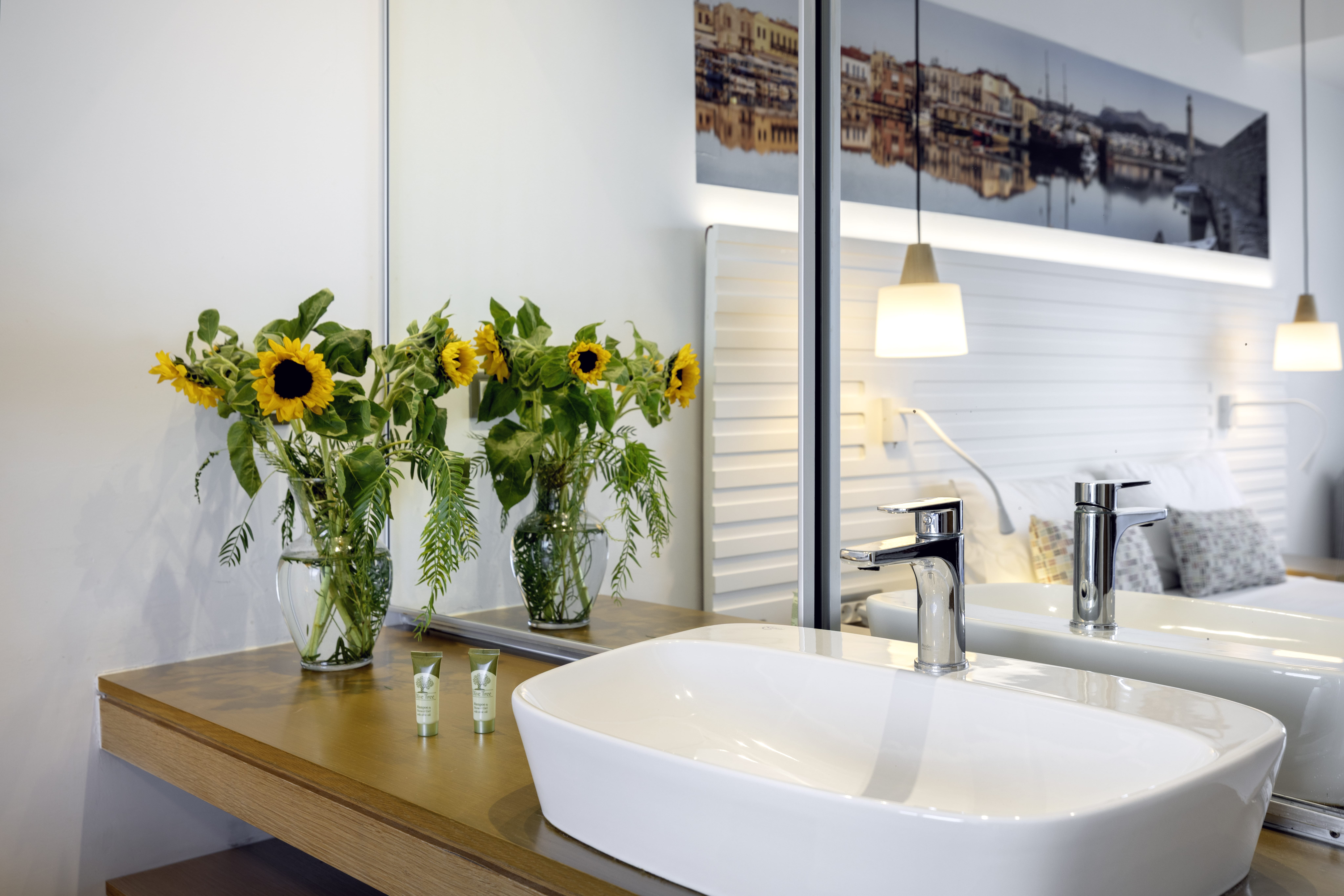 a sink with yellow flowers