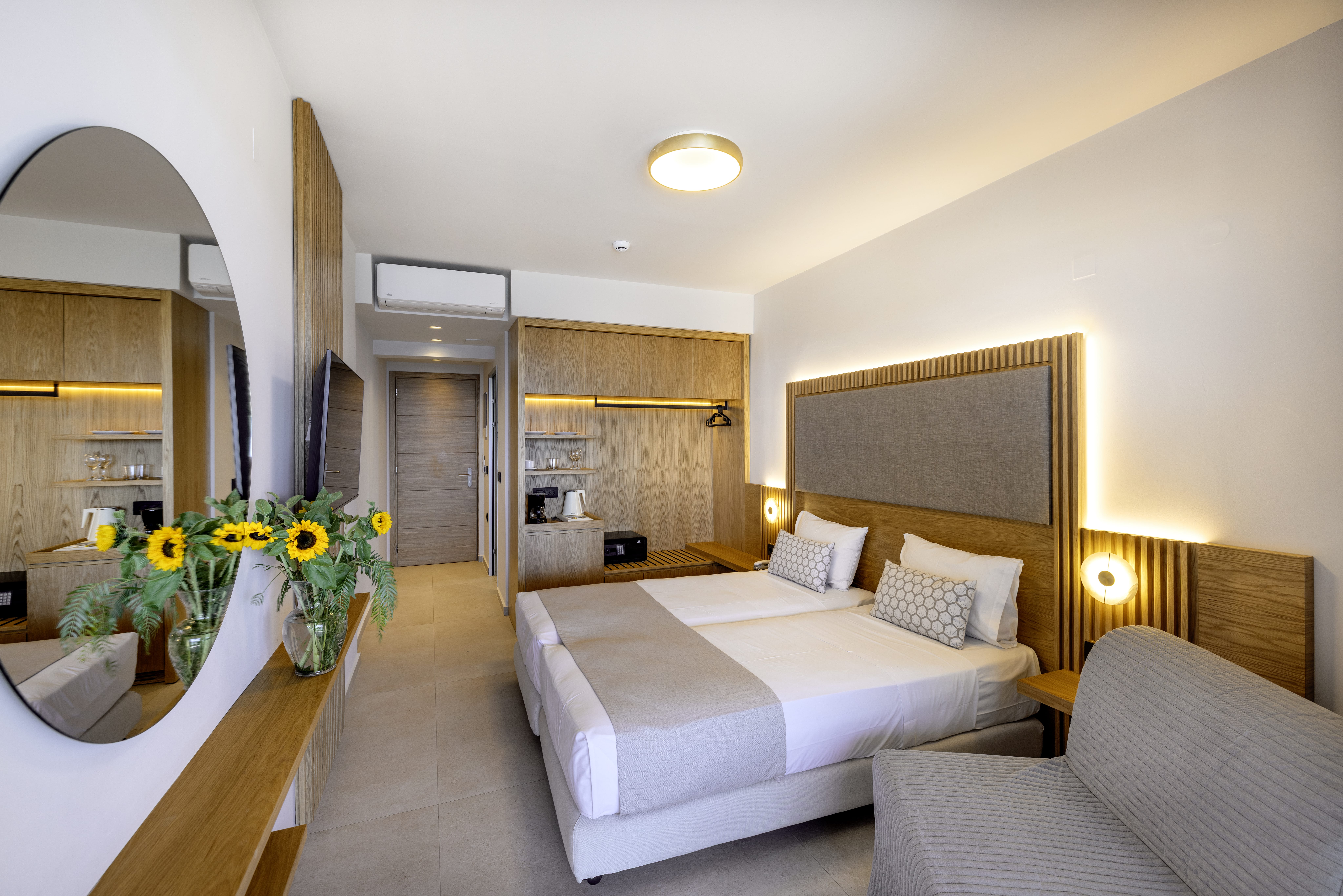 a large room with a bed and a couch