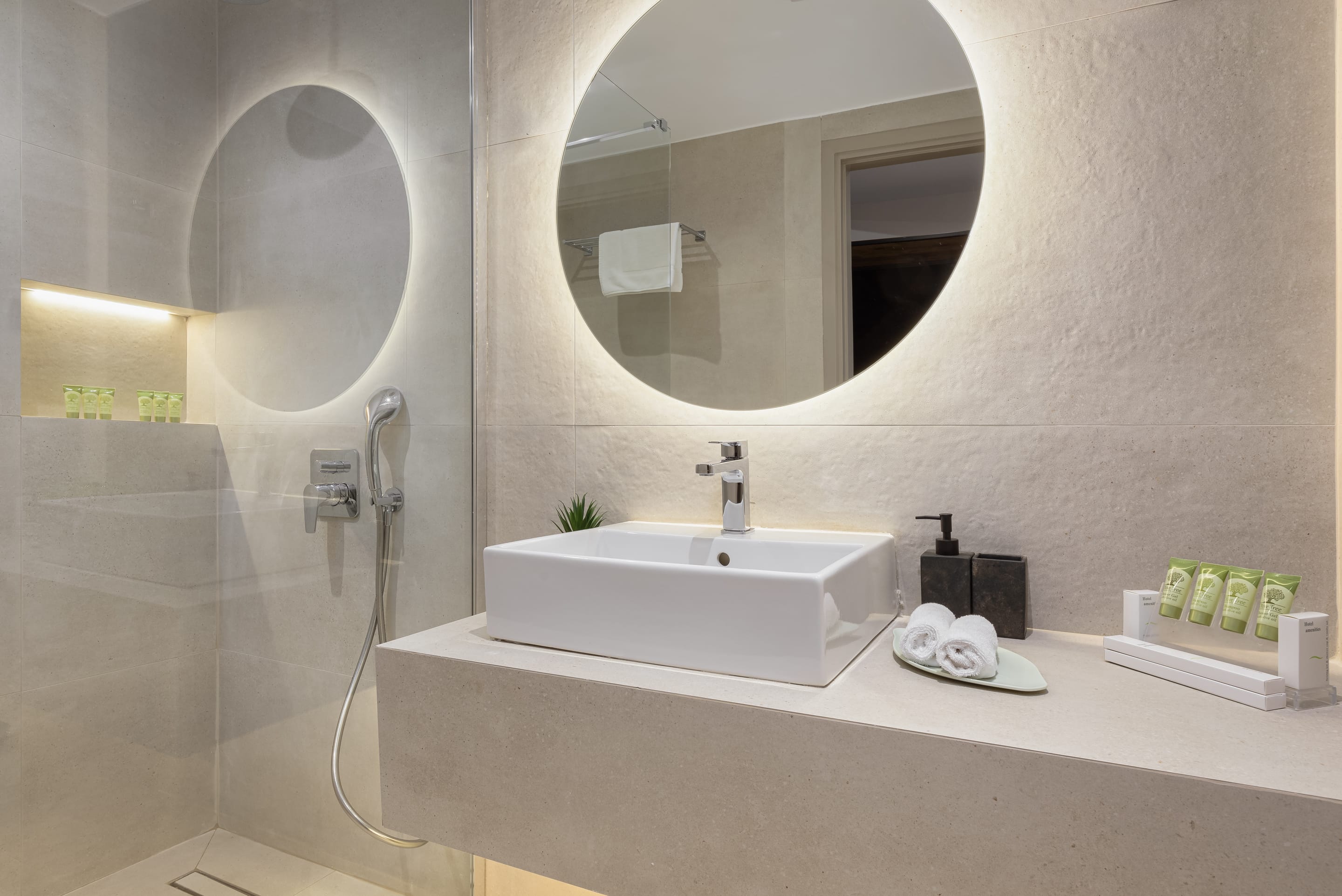 a bathroom with a large mirror