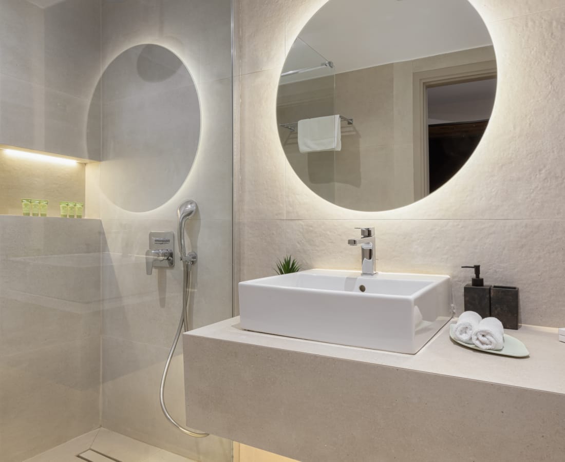 a bathroom with a large mirror