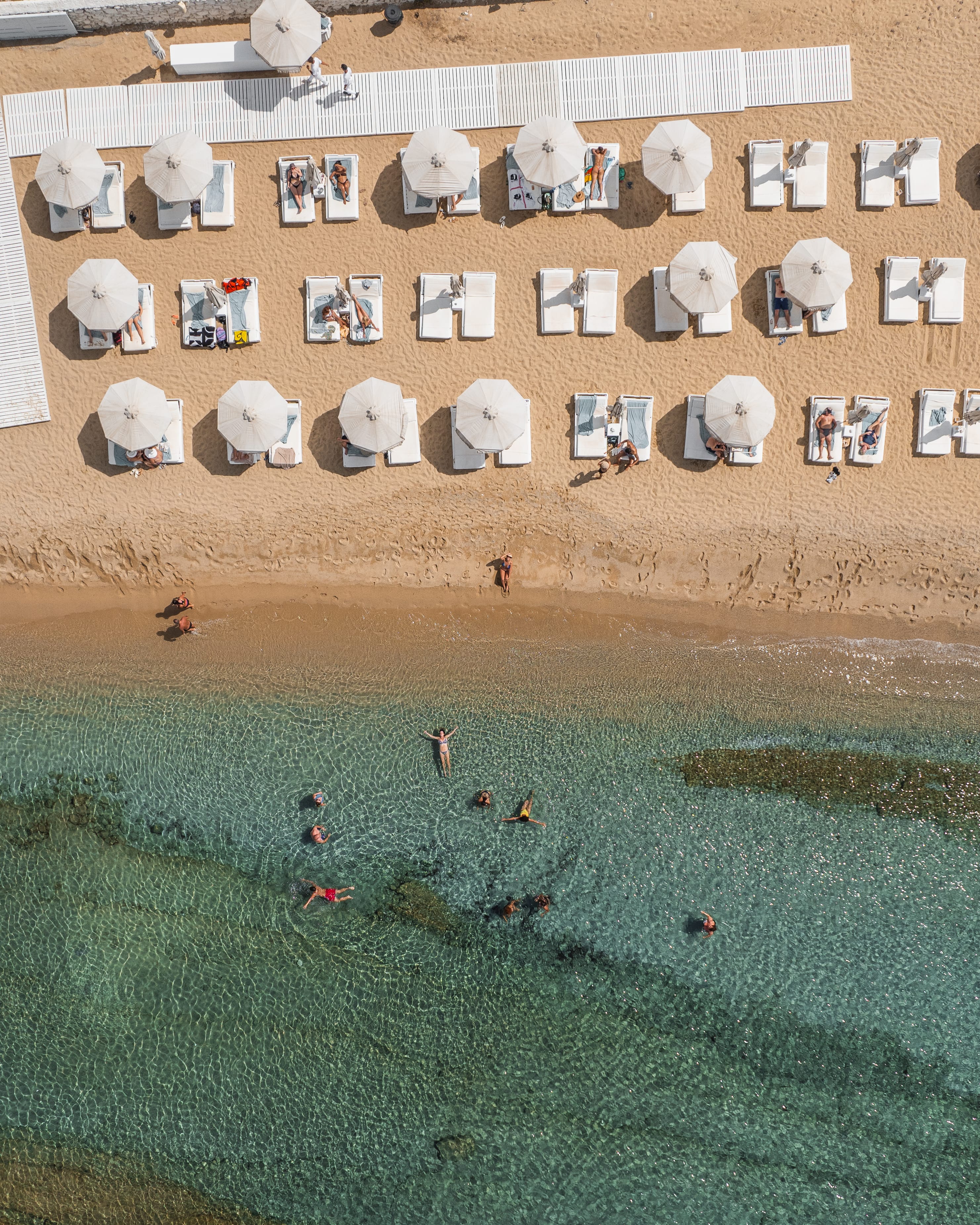 a wall with a group of people on it