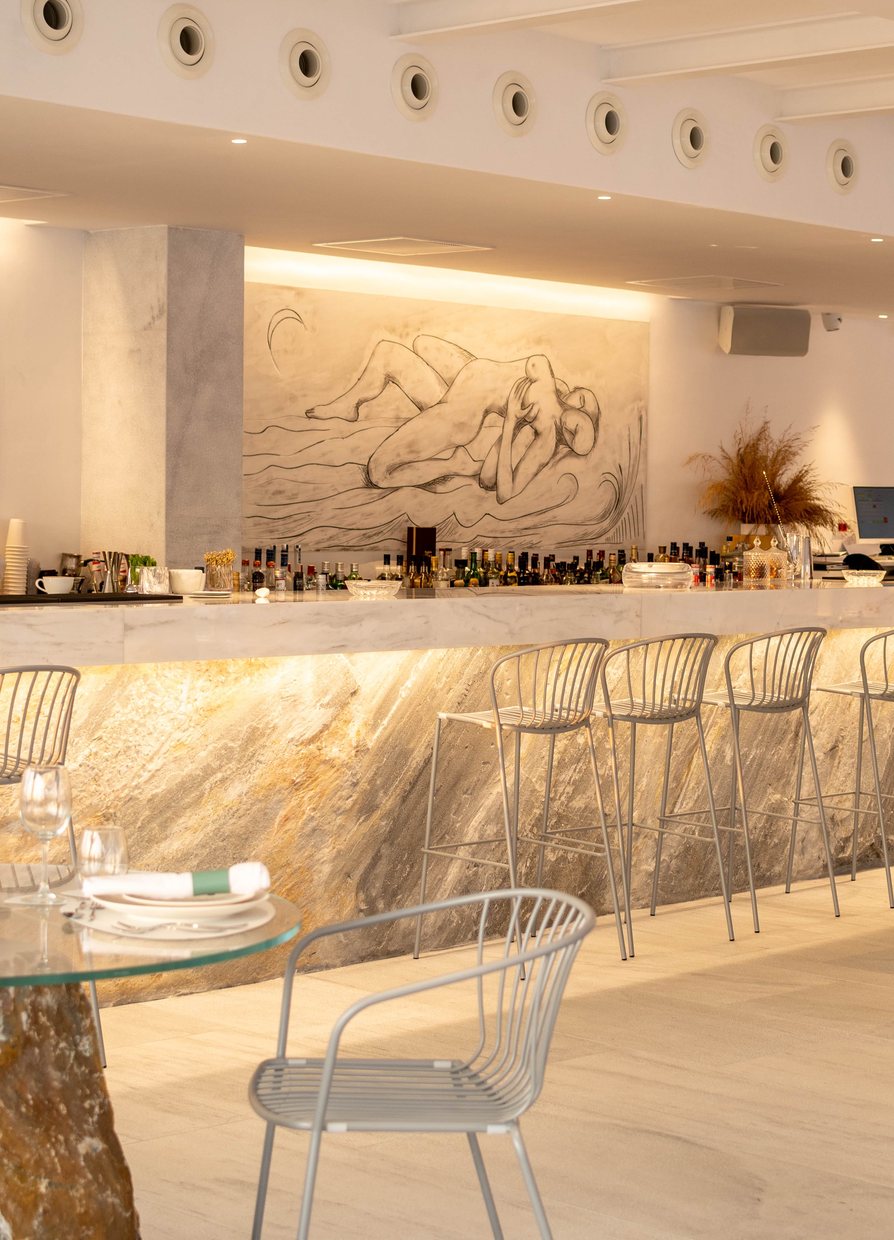 a room with a table and chairs