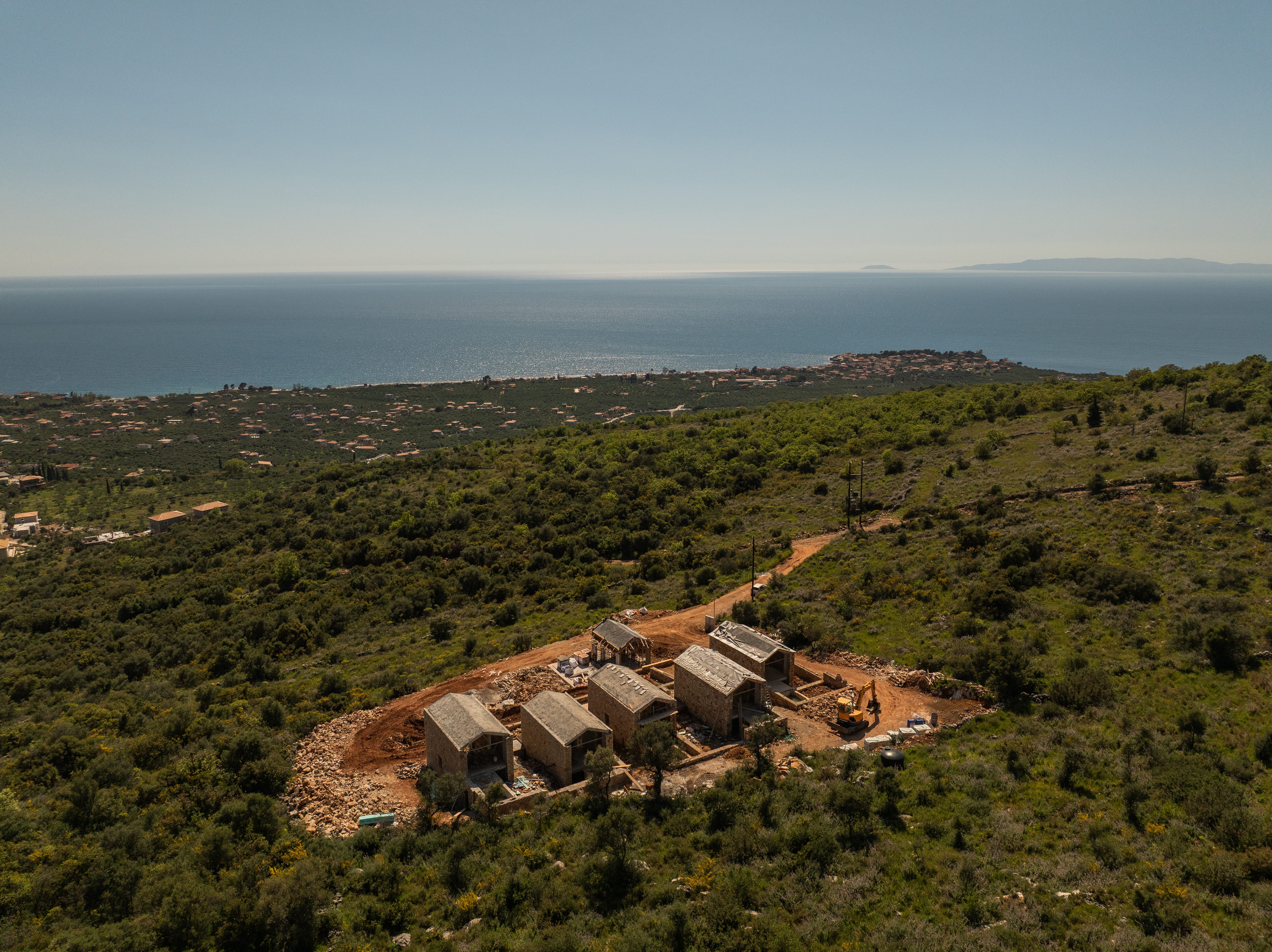 a group of buildings on a hill