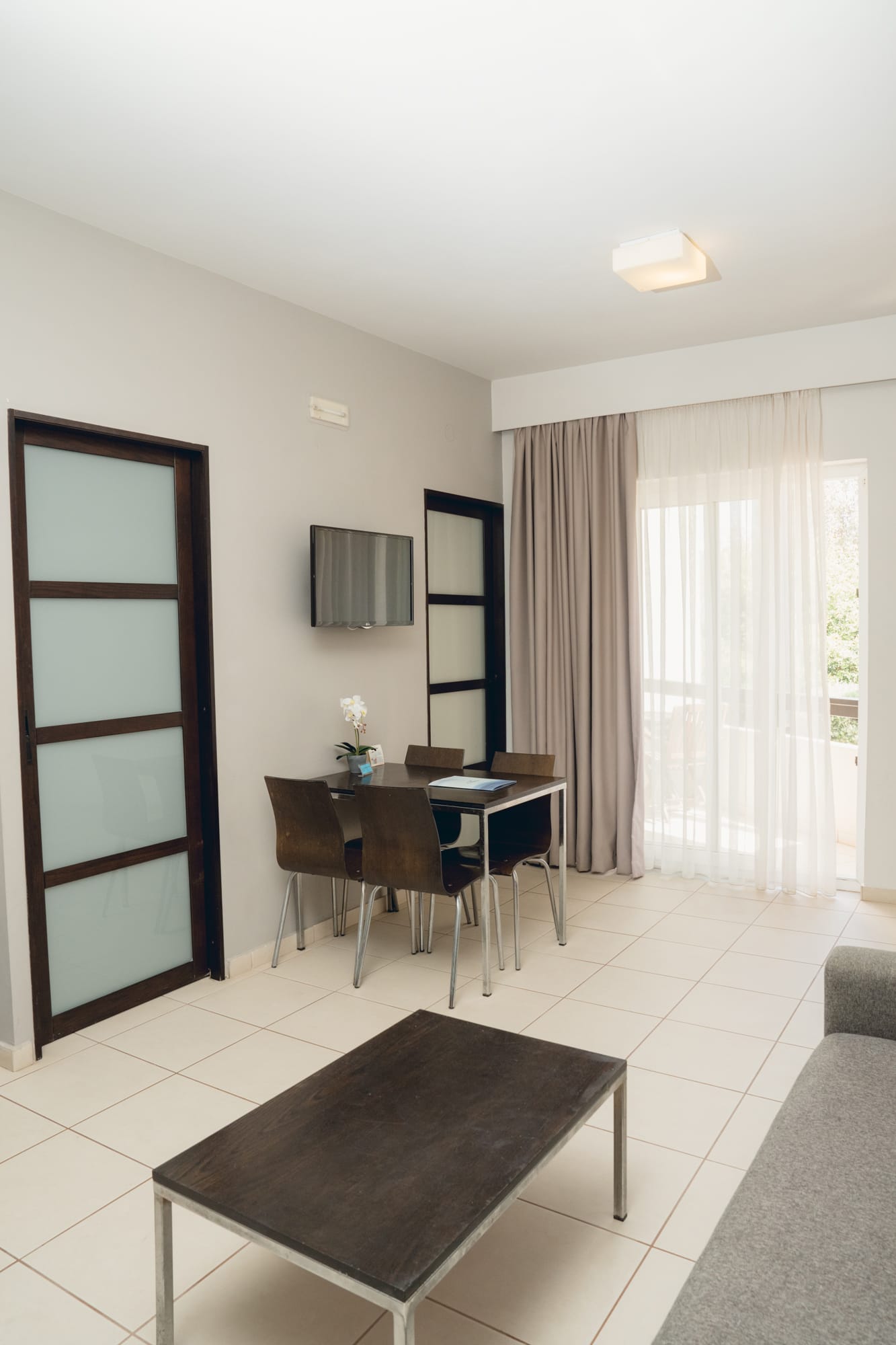 a room with a table and chairs