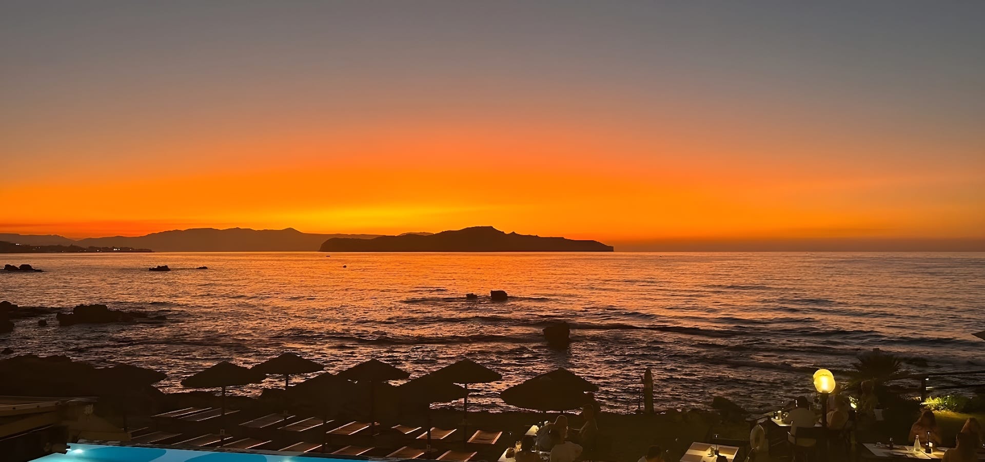 a sunset over a body of water