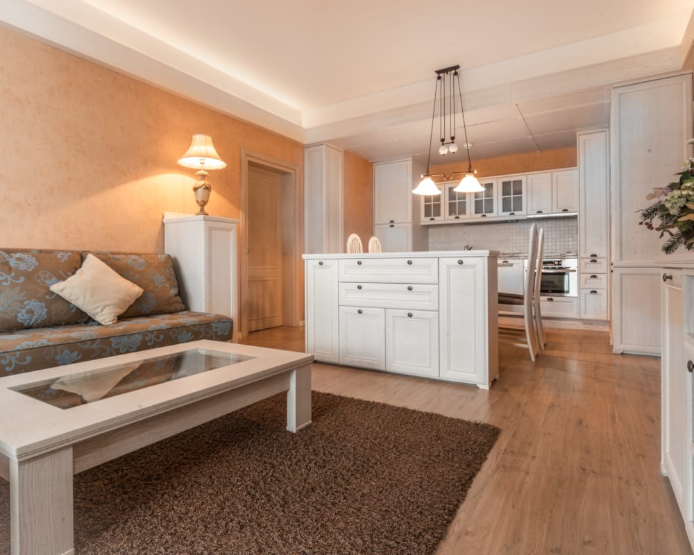 a living room with a couch and a table